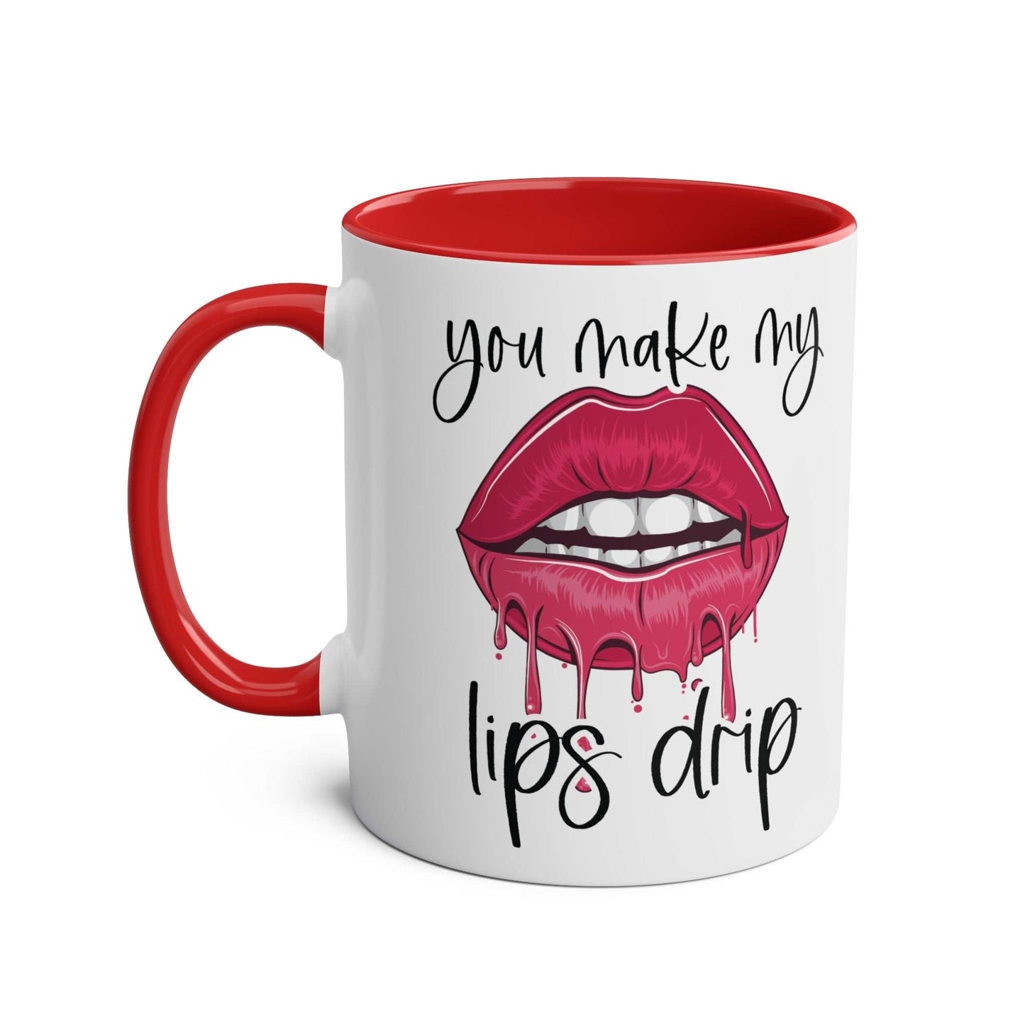 Ceramic mug with "You Make My Lips Drip" design, red rim and handle.