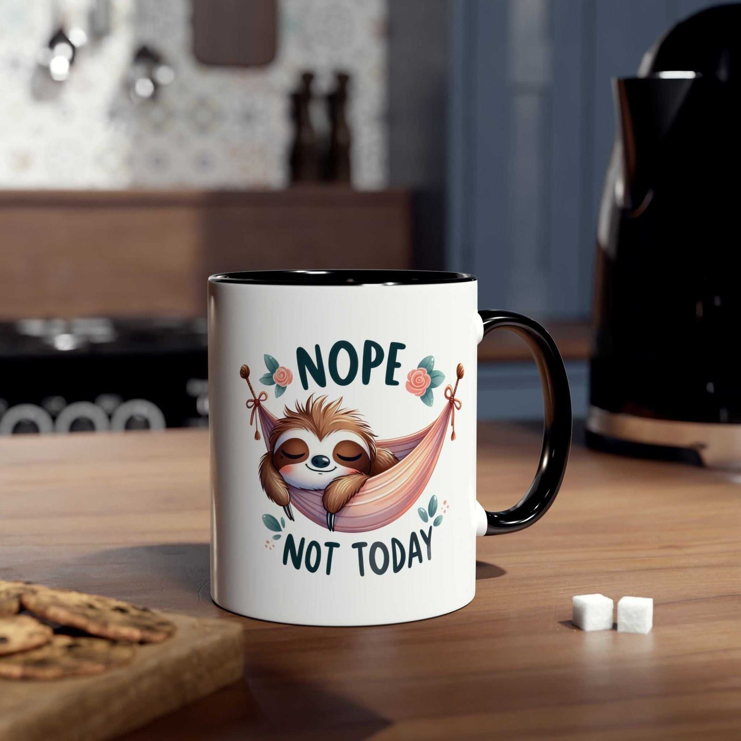 Cute sloth coffee mug with "Nope Not Today" design on kitchen counter.