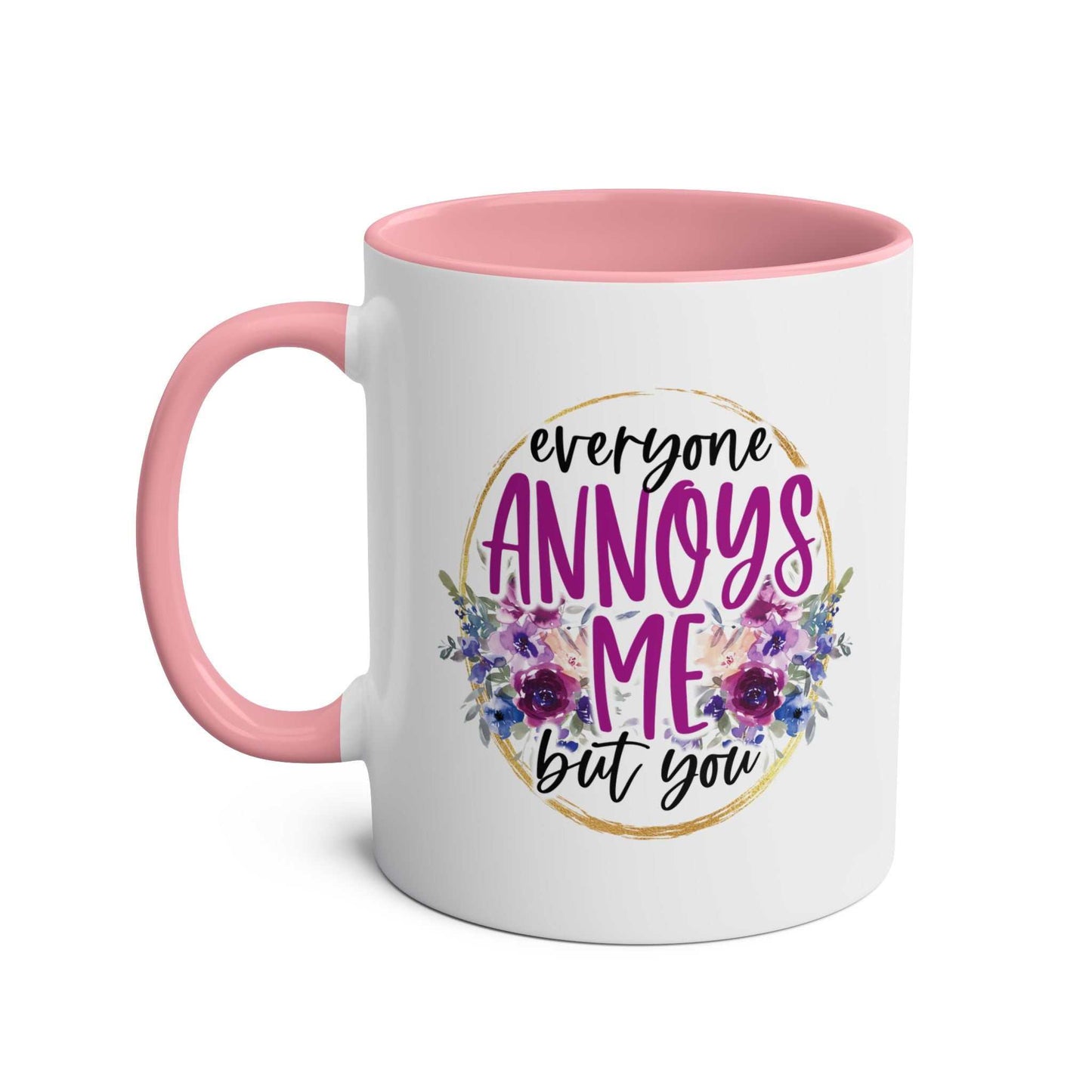 Everyone Annoys Me But You Coffee Mug with pink handle and floral design.