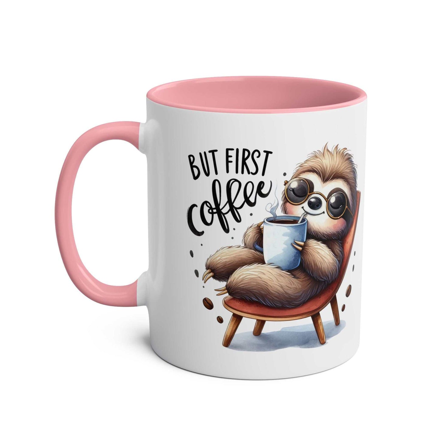Cute sloth coffee mug with pink handle, featuring a whimsical sloth design and text "But First Coffee."