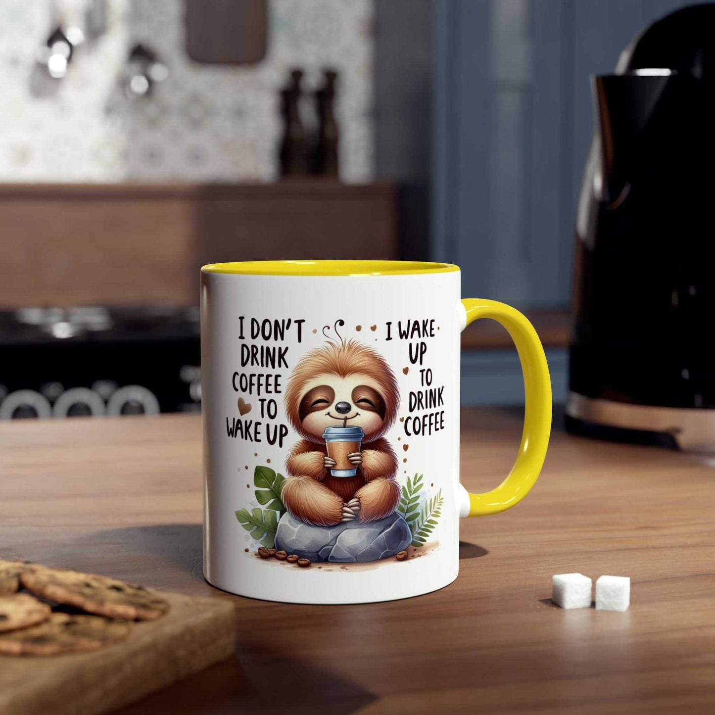 cute sloth coffee mug with colorful design on kitchen counter