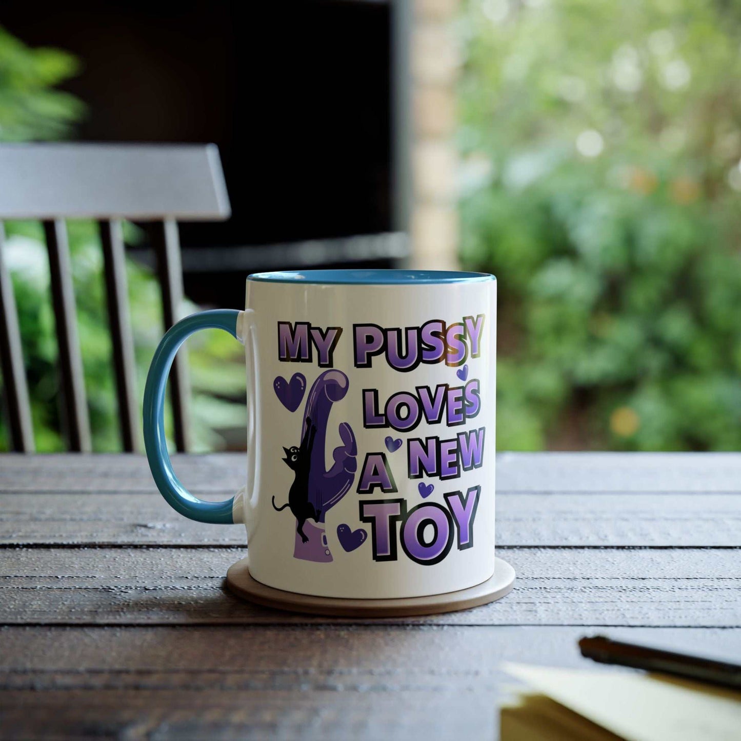 Cheeky Fun Coffee Mug with playful design and humorous text on wooden table.