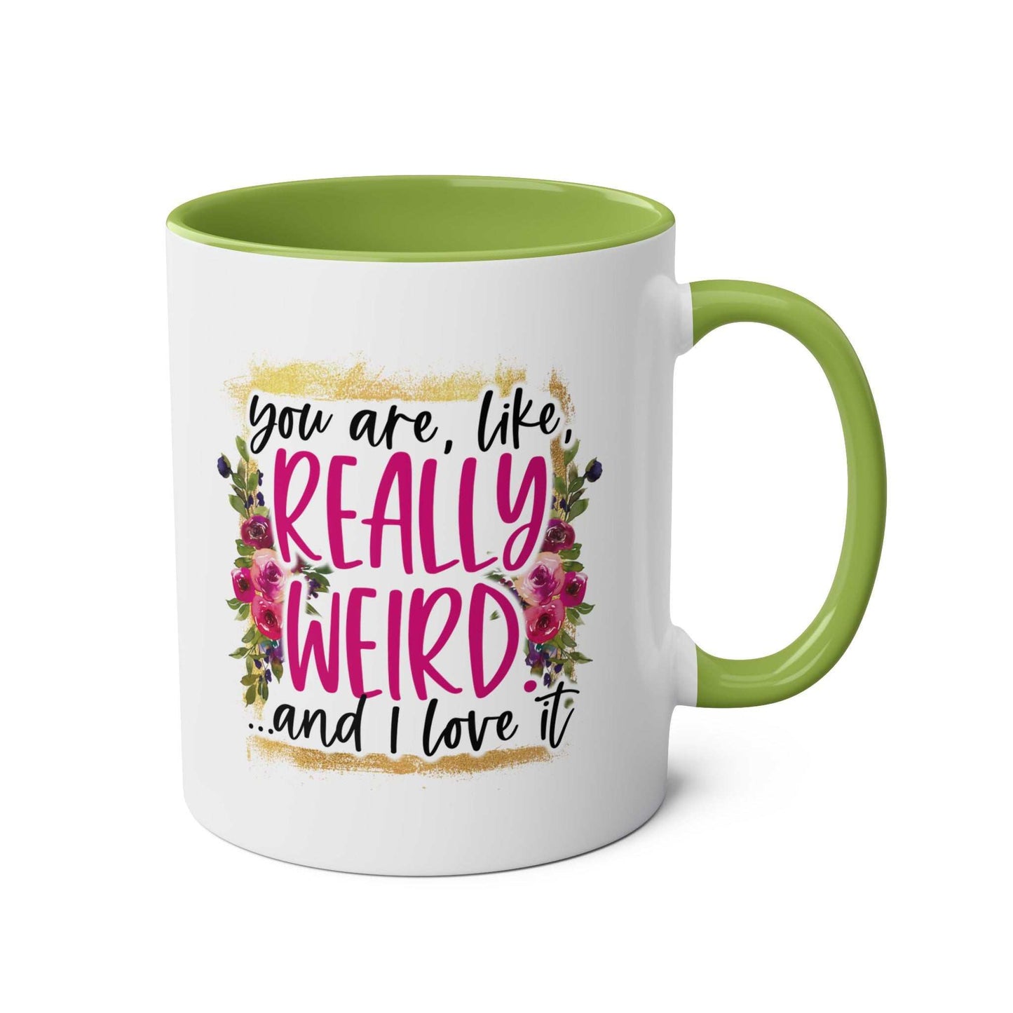 Really Weird Coffee Mug with green handle and humorous text design.