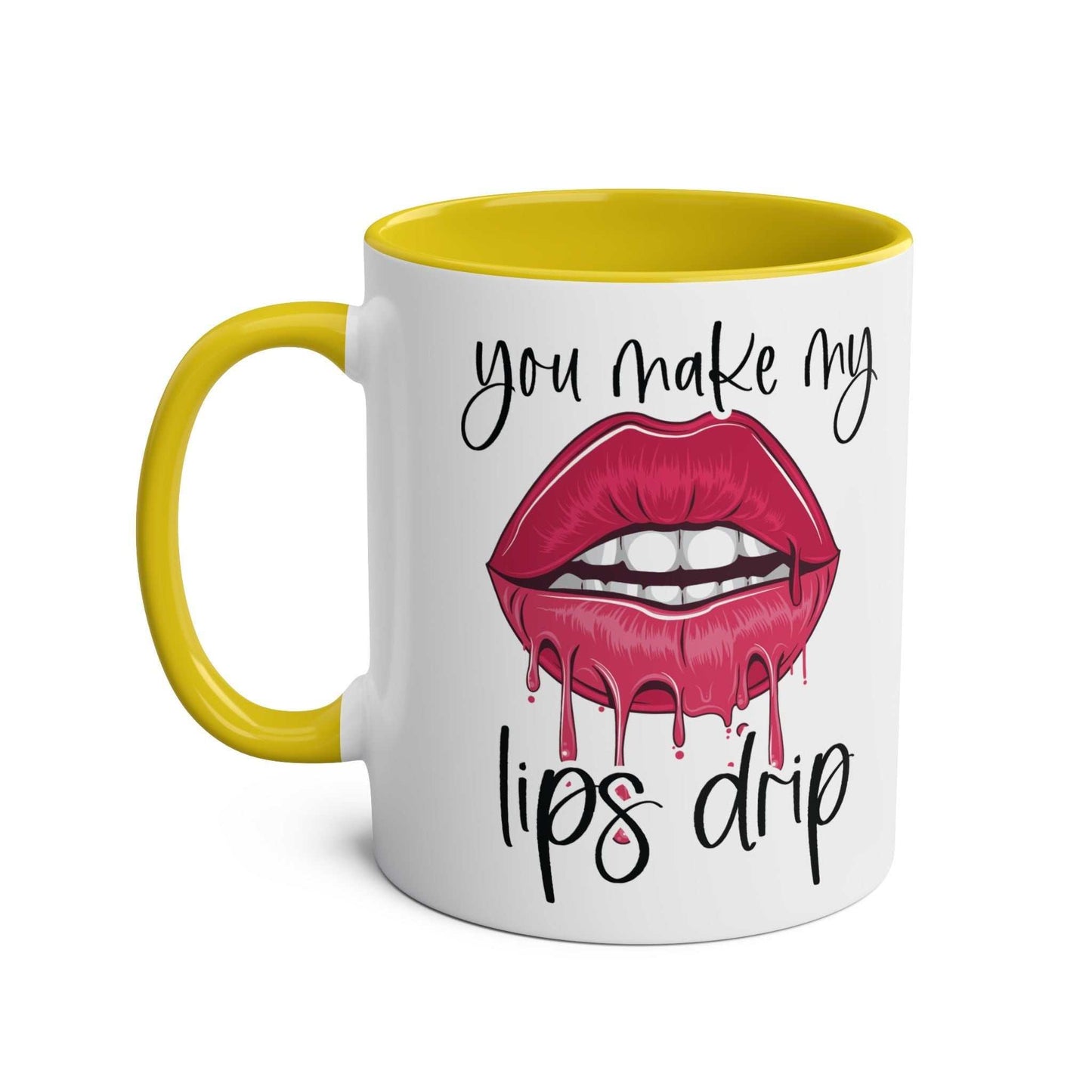 Ceramic mug with "You Make My Lips Drip" design, yellow interior and handle.