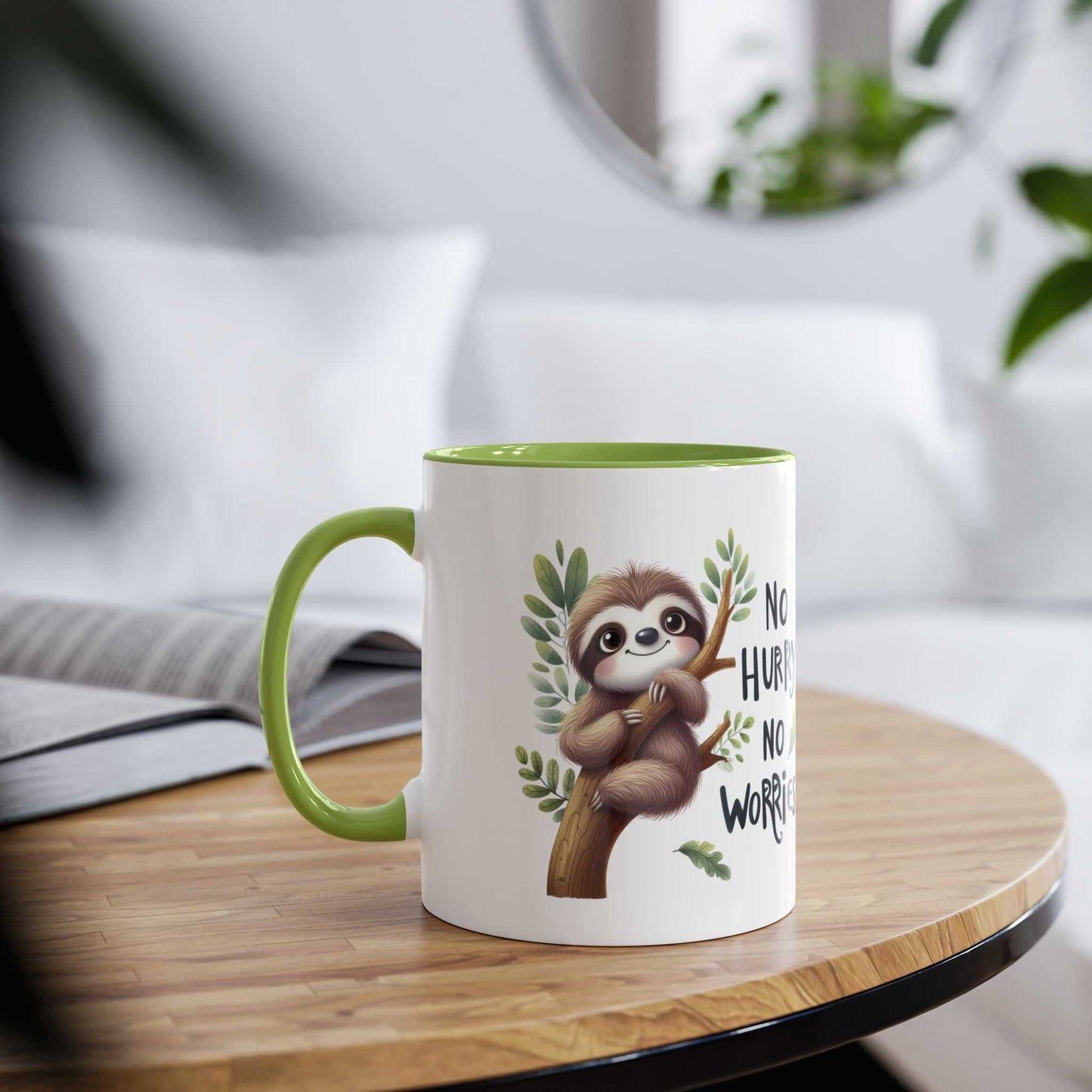 Cute sloth coffee mug with green interior and whimsical design on wooden table.
