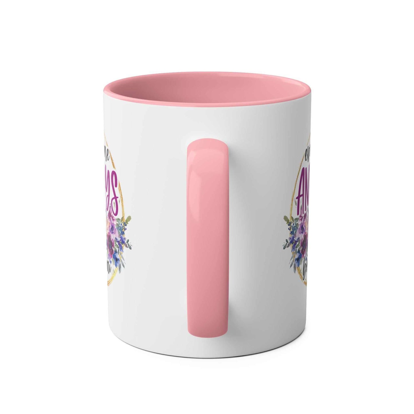 Pink-handled ceramic mug with "Everyone Annoys Me But You" text, floral design.