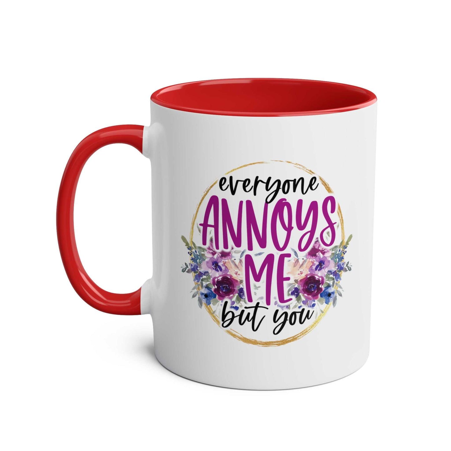 Everyone Annoys Me But You coffee mug with red handle and floral design.