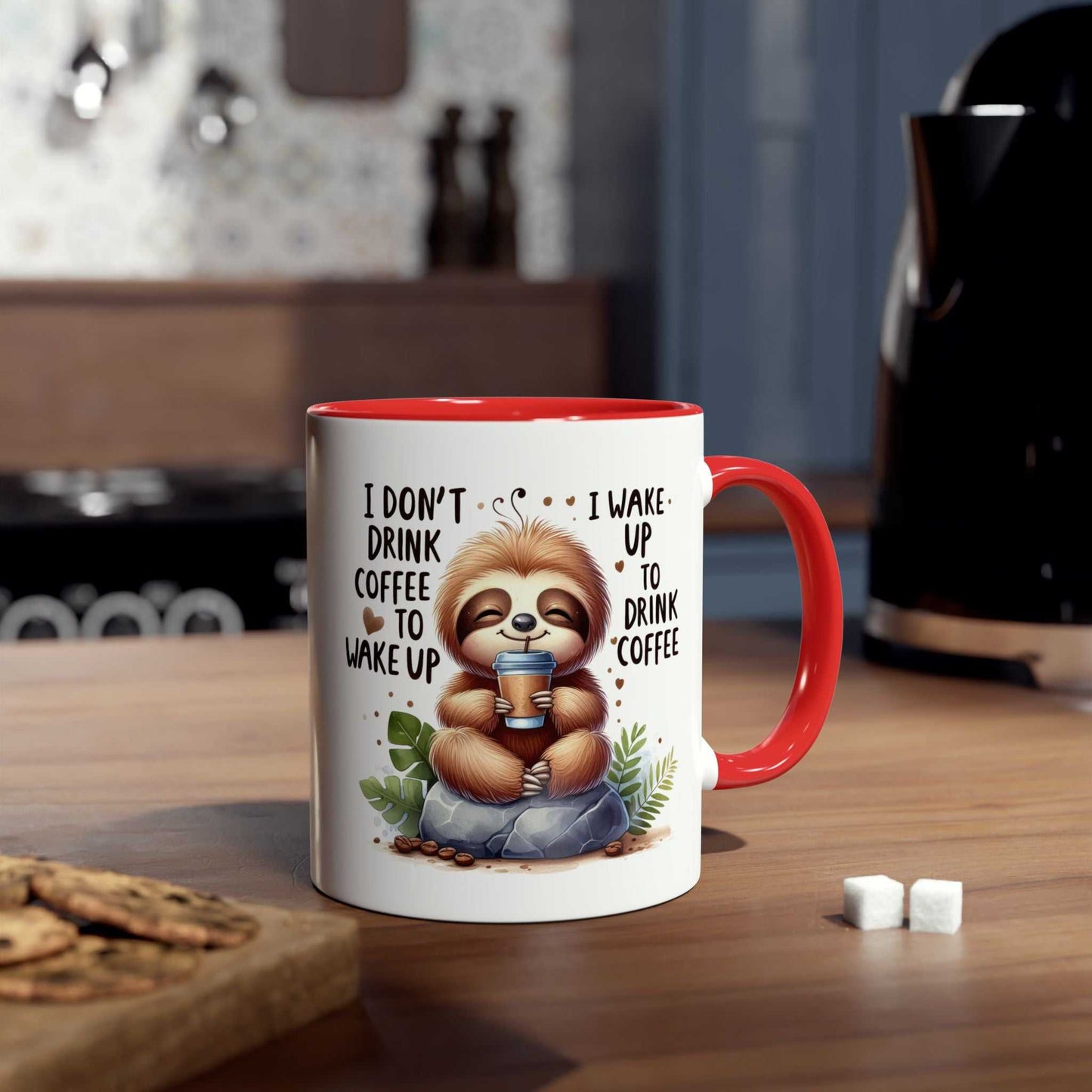 Cute sloth coffee mug in kitchen setting with text saying "I don't drink coffee to wake up, I wake up to drink coffee."