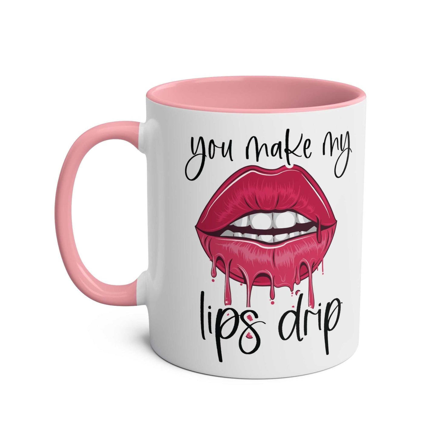 Ceramic mug with "You Make My Lips Drip" design, pink rim and handle.