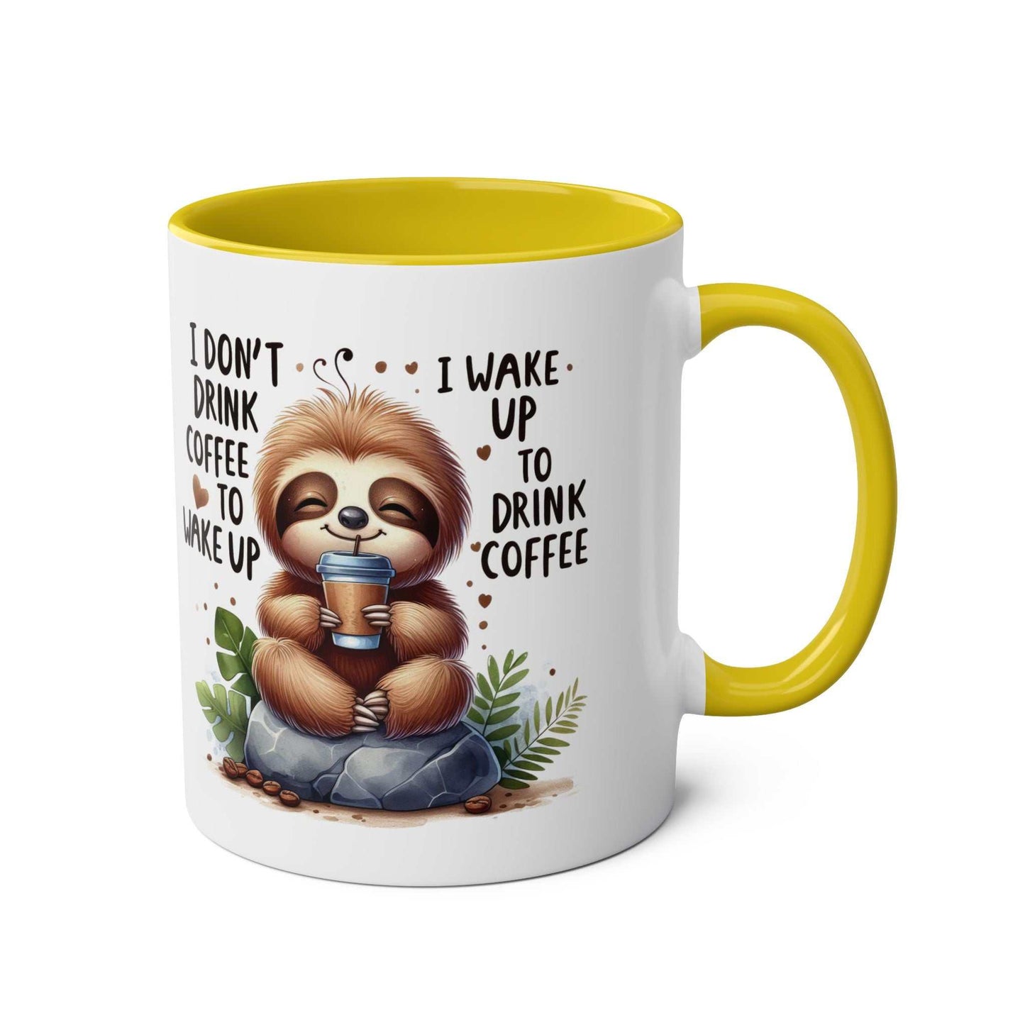 Cute sloth coffee mug with yellow handle and cheerful design.