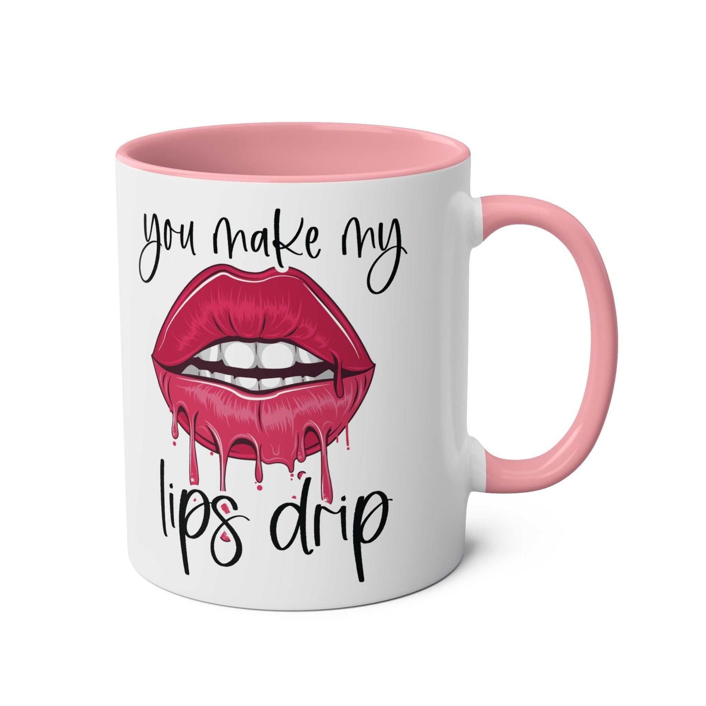 "You Make My Lips Drip Fun Mug" with pink handle and rim, featuring playful lip design.