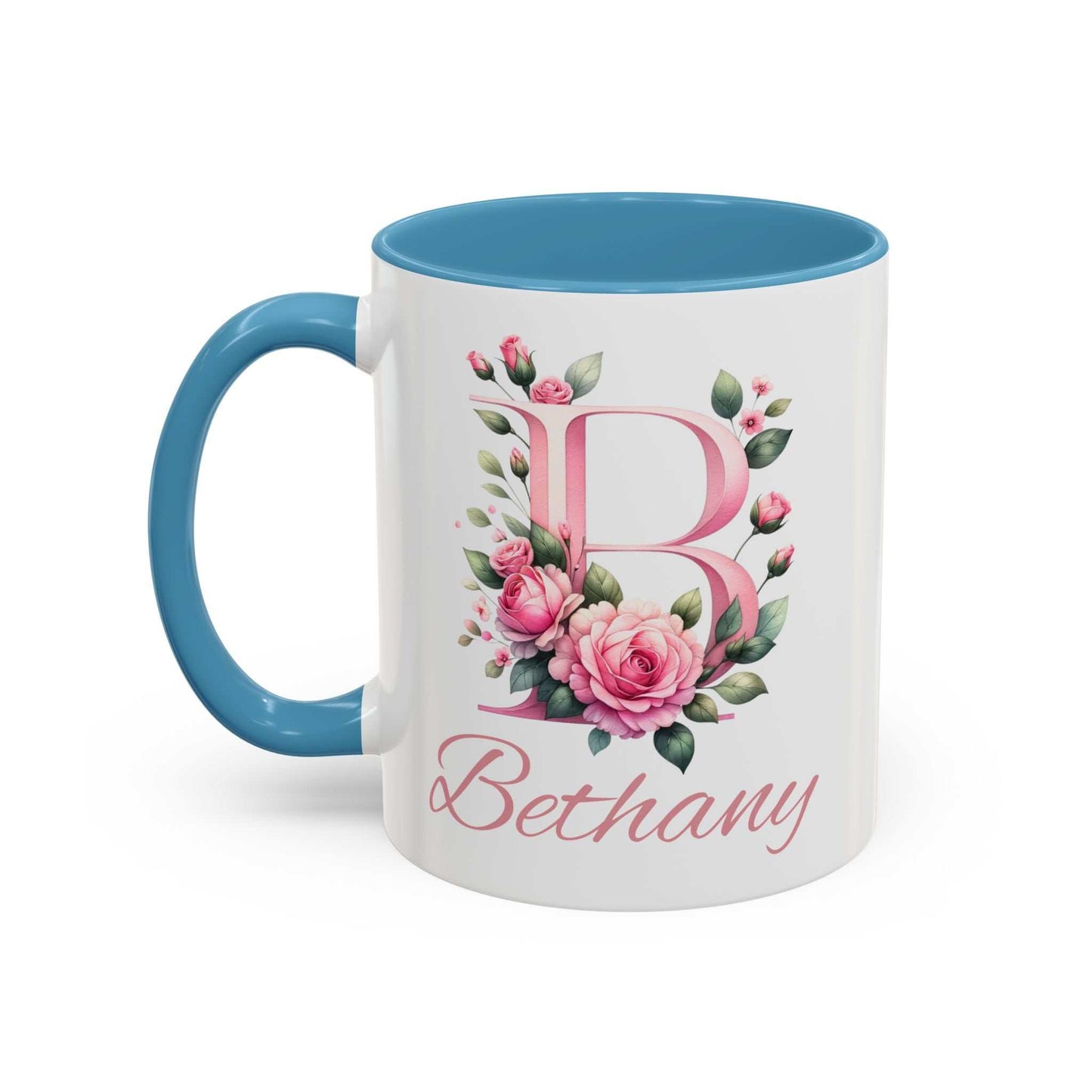 Personalised watercolour roses gift mug with blue handle and rim featuring name and initial.
