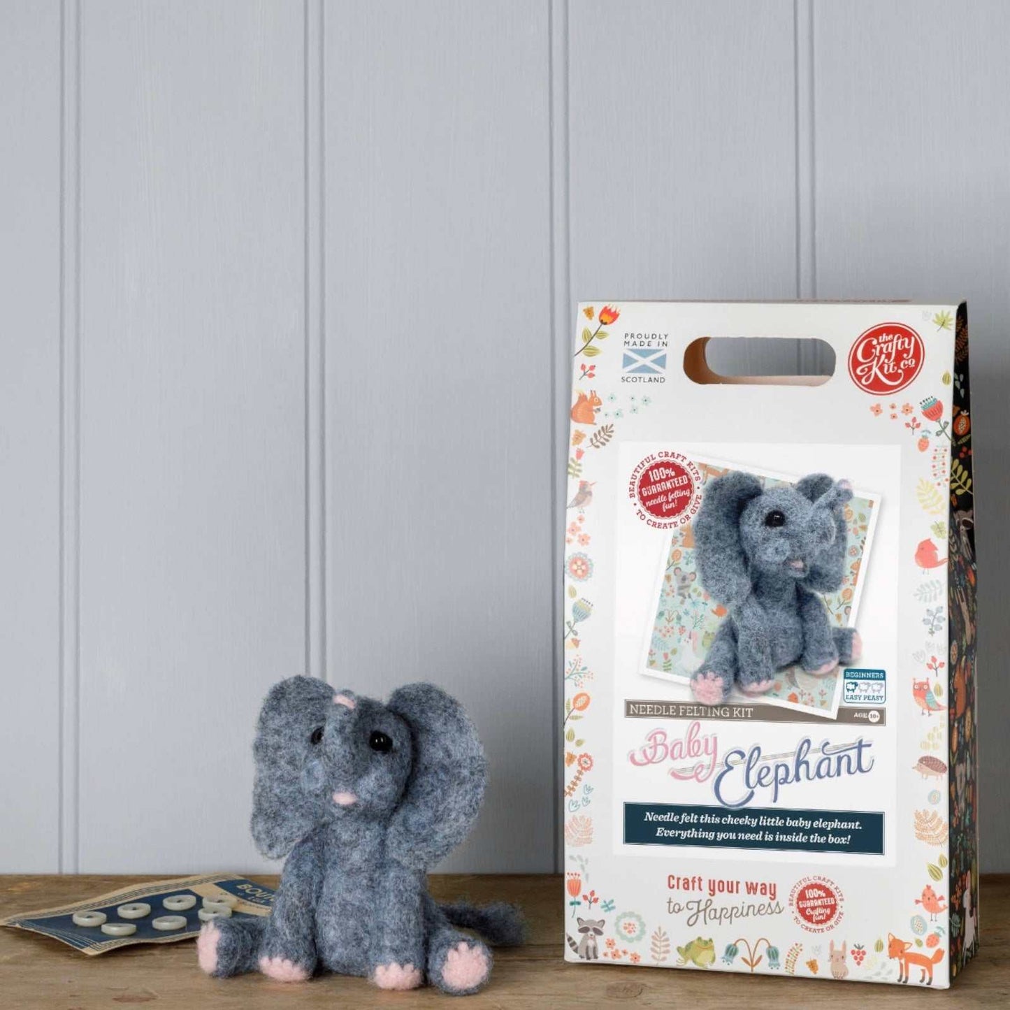 Baby Elephant Needle Felting Craft Kit with finished elephant figure and packaging.