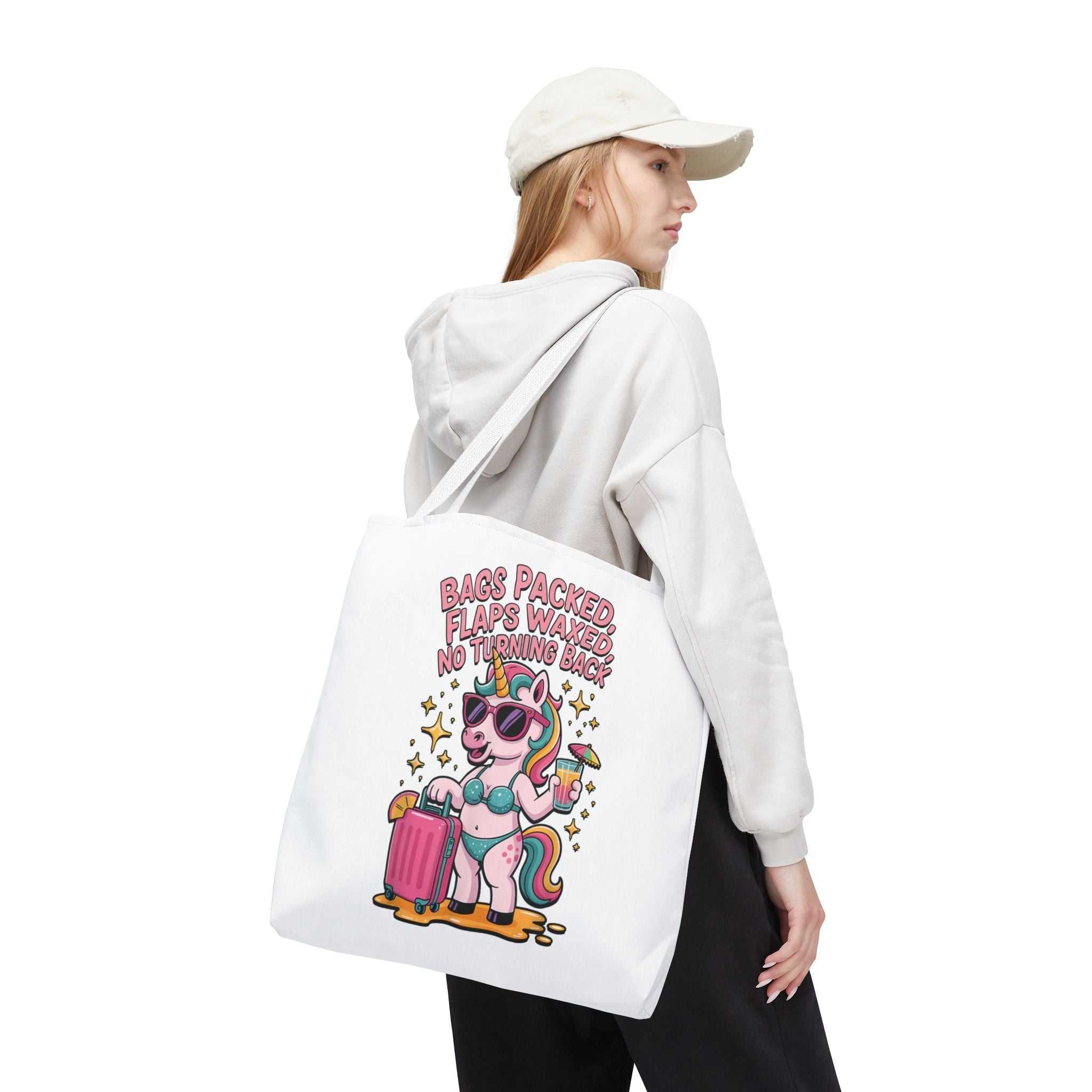 Fun unicorn travel tote bag with cheeky printed design and colorful handles
