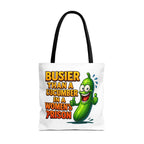 Busier Than a Cucumber Tote Bag with cheeky design, durable spun polyester, available in three sizes and multiple handle colors.
