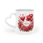 Gorgeous Valentines Day mug with heart-shaped handle and vibrant floral design.