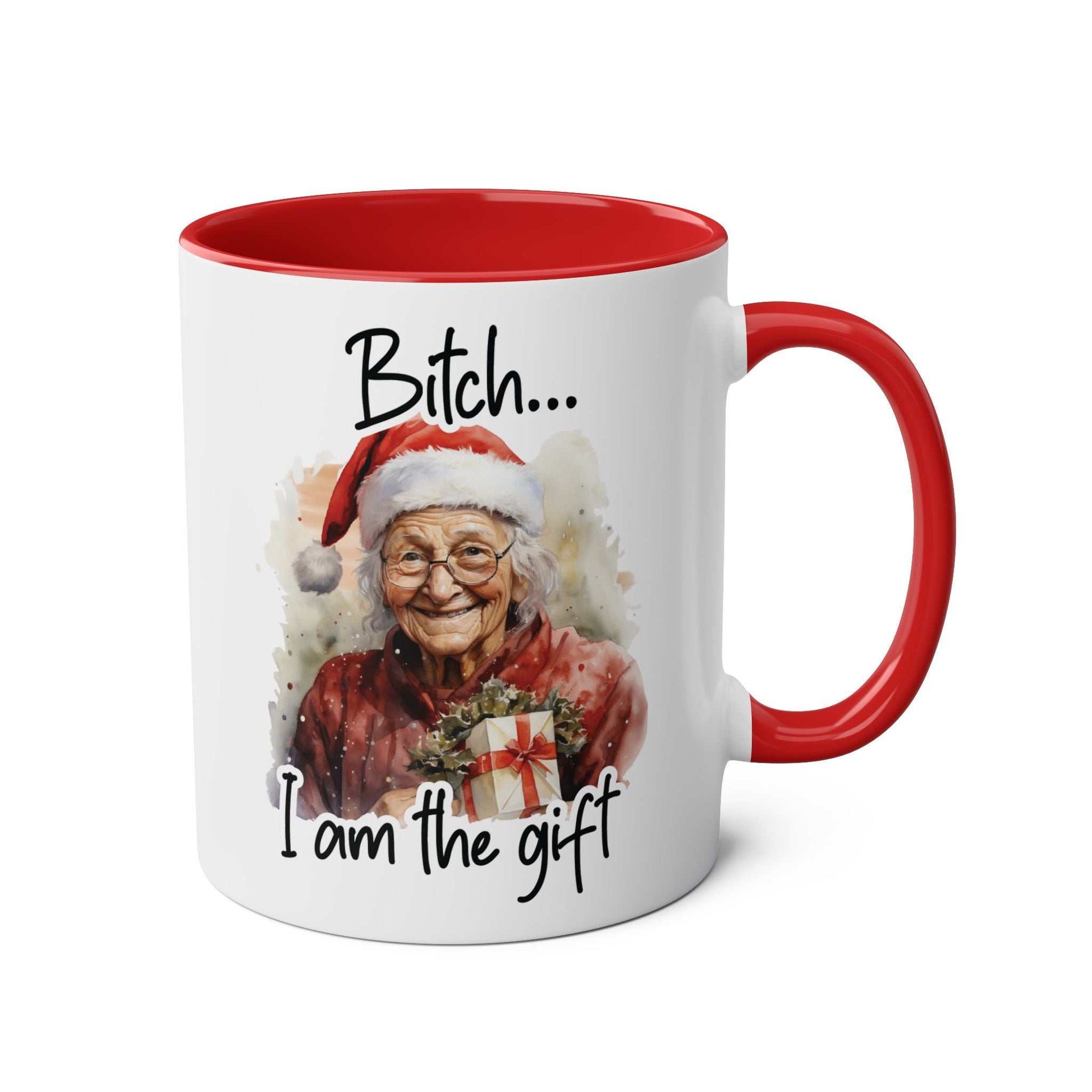 Sweary Granny Christmas Mug with festive design, red handle, and "Bitch... I am the gift" slogan.