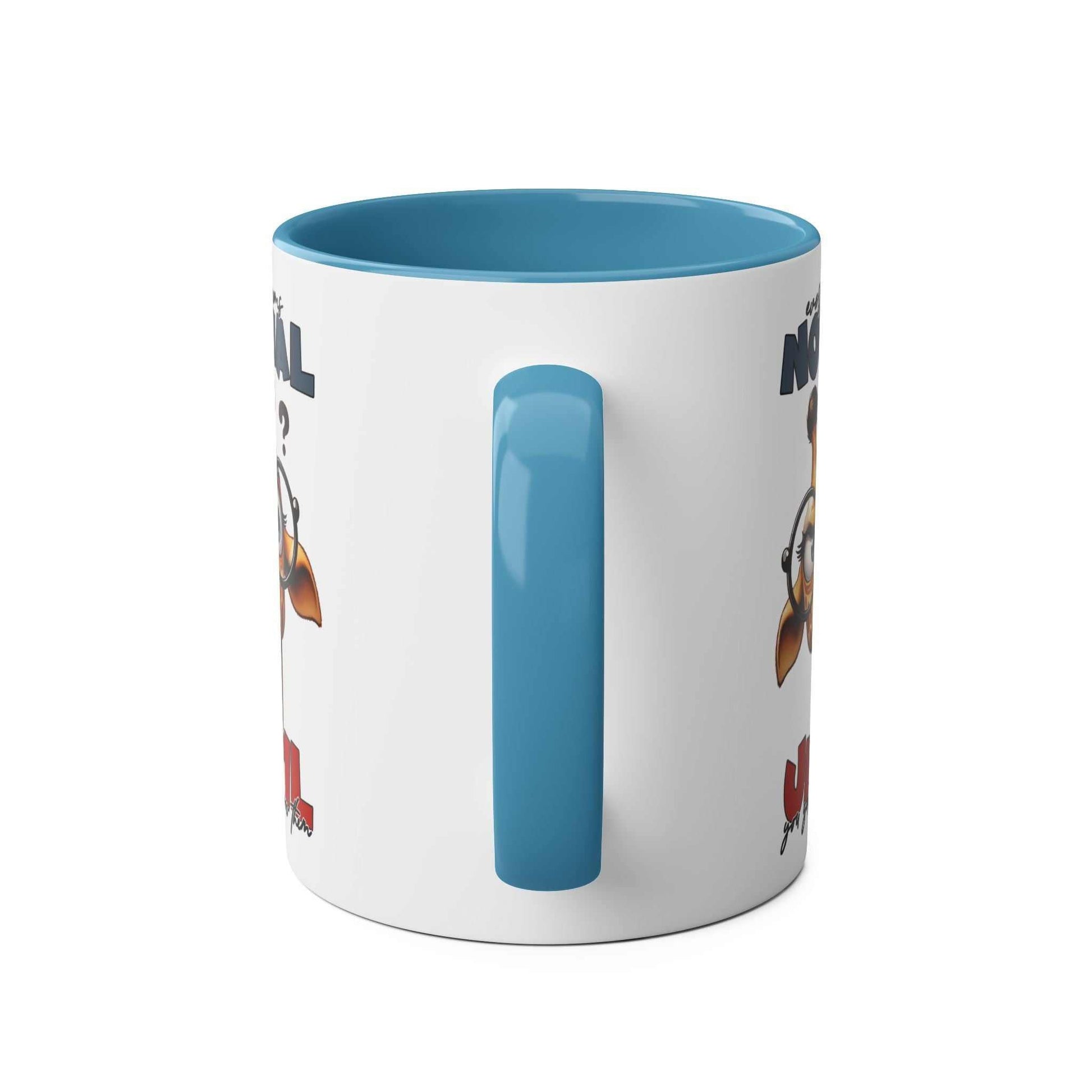 Everyones Normal Coffee Mug with playful giraffe design and blue handle.