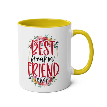 Best Freaking Friend Coffee Mug with fun floral design, yellow handle, and inside; perfect gift for coffee lovers.