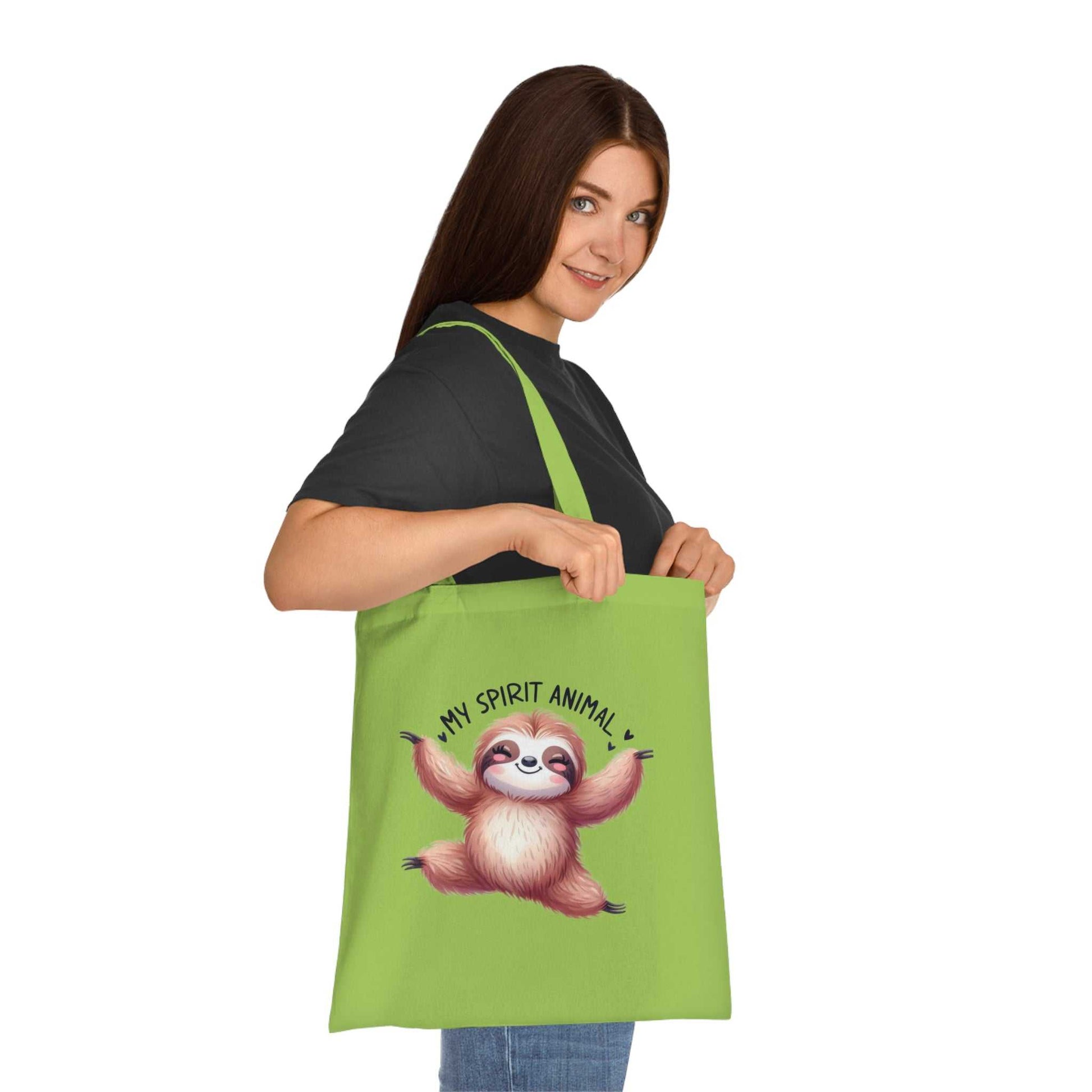 Cotton tote bag featuring cute sloth design, perfect for sloth lovers and whimsical accessory fans.