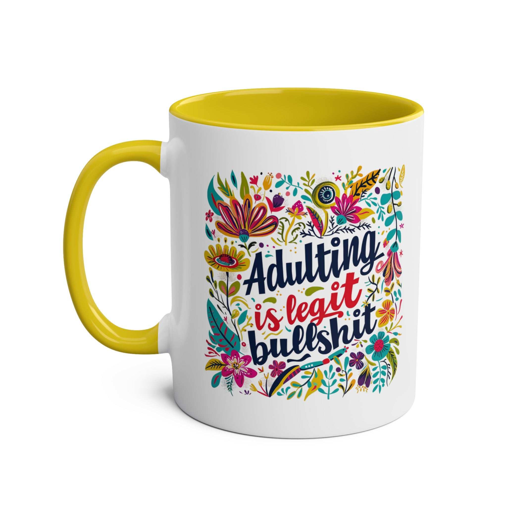 Colorful "Adulting Is Bullshit" coffee mug with floral design and yellow interior.