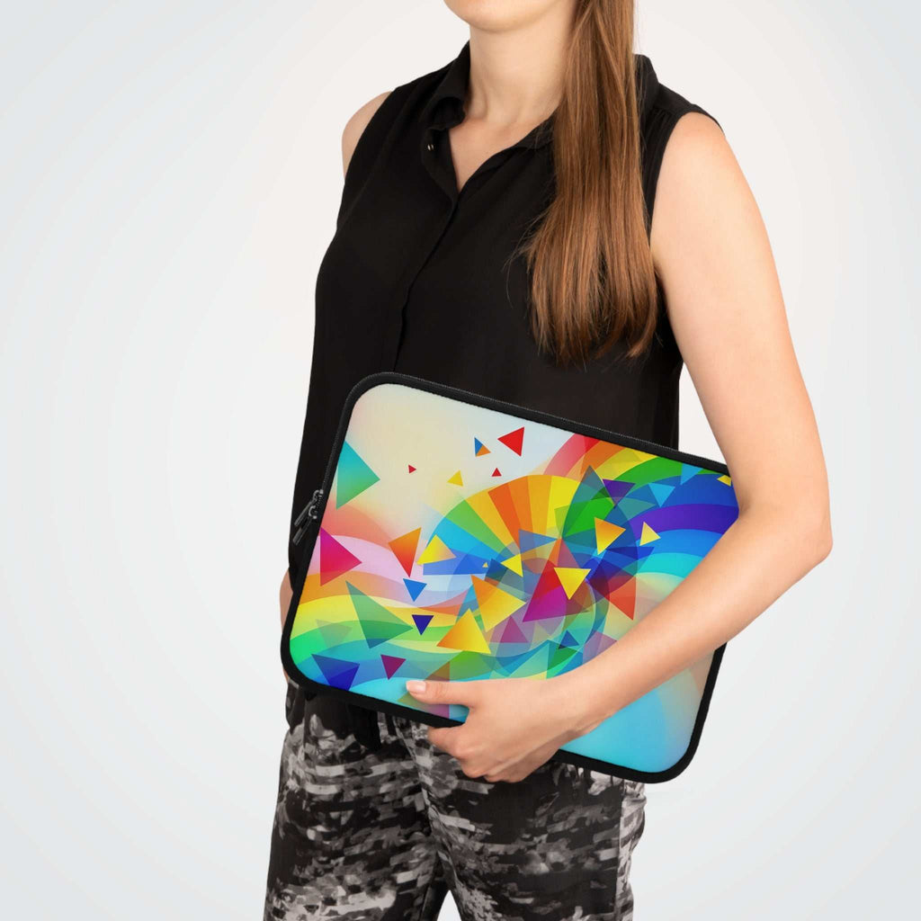 Woman holding colorful geometric pride design laptop sleeve with neoprene material and dual zipper closure
