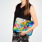 Woman holding colorful geometric pride design laptop sleeve with neoprene material and dual zipper closure