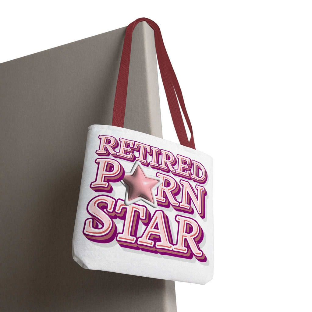 Cheeky Retired Porn Star Tote Bag in multiple sizes with colorful handles and durable spun polyester fabric for everyday use