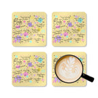 Bestie Yellow Coaster Set with playful designs and high-gloss finish, 4-piece, cork back, rounded corners.