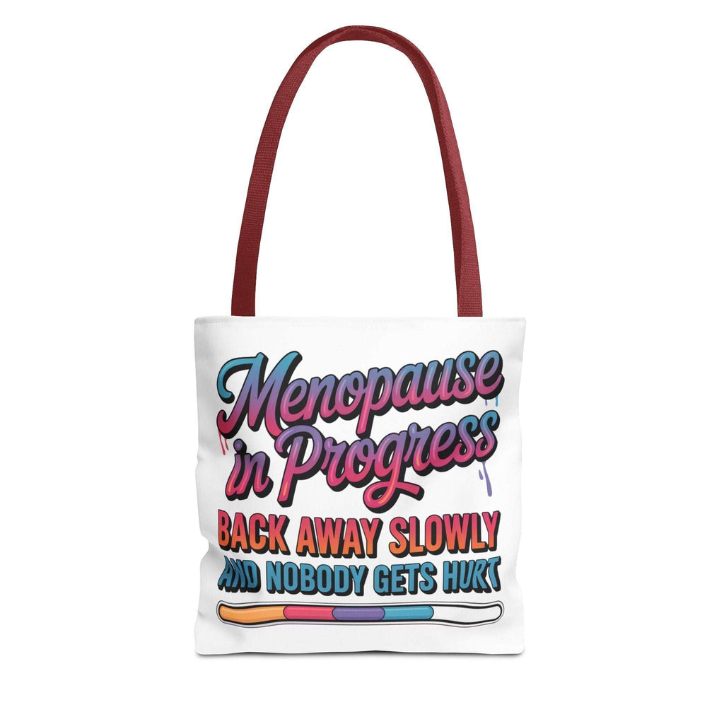 Menopause in Progress tote bag with cheeky design, durable spun polyester, multiple sizes and handle color options