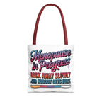 Menopause in Progress tote bag with cheeky design, durable spun polyester, multiple sizes and handle color options