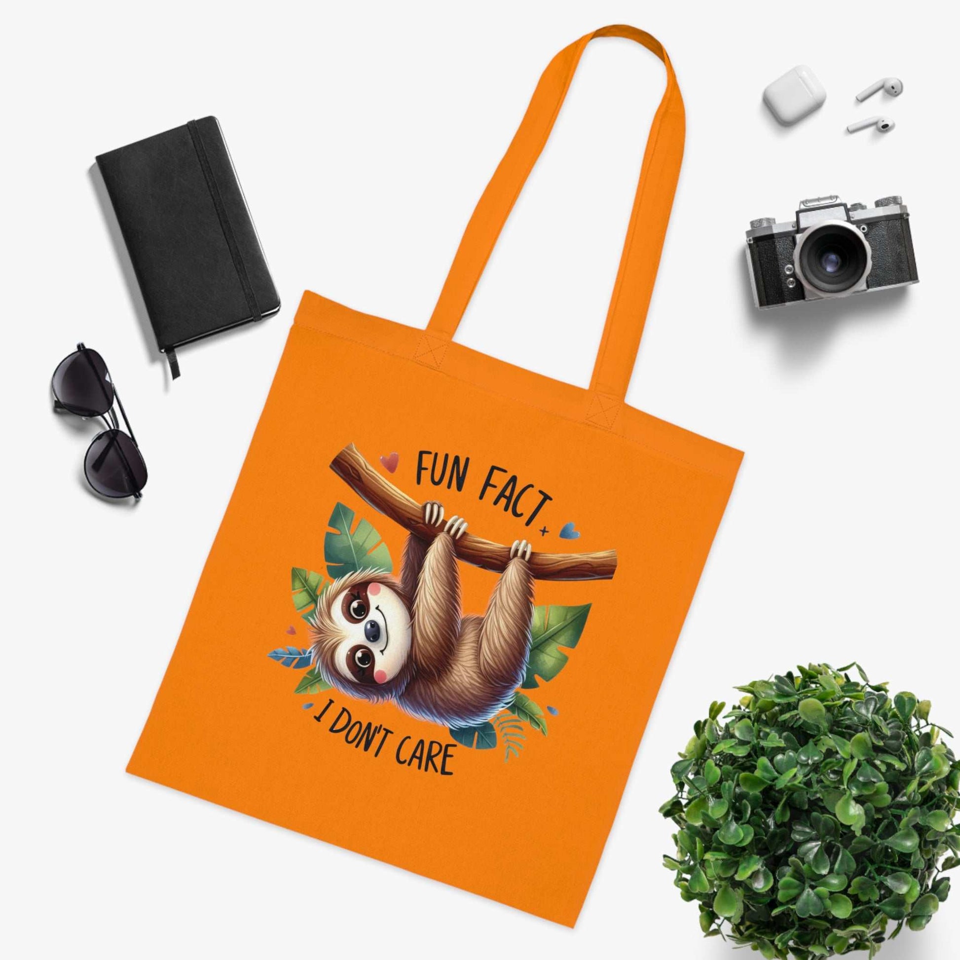 Cute sloth cotton tote bag with vibrant design, ideal for sloth lovers and whimsical style enthusiasts.