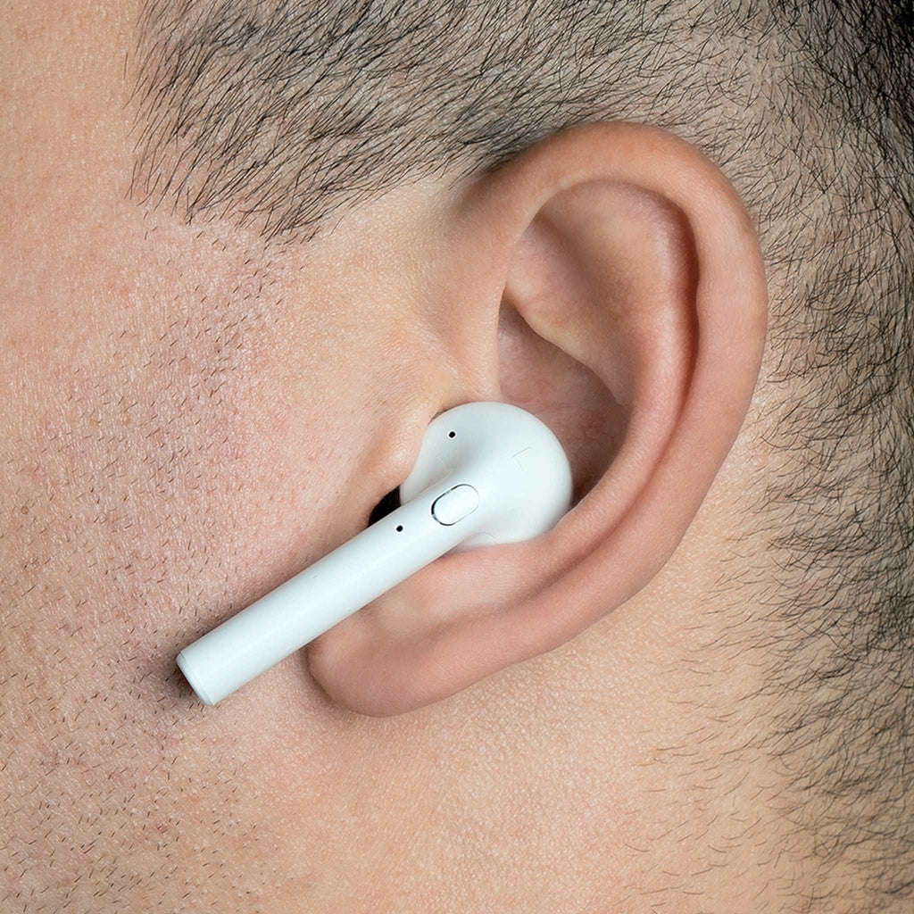 Close-up of white wireless earbud in person's ear for Wolves Fc Wireless Earbuds product
