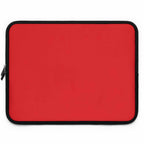 Red neoprene laptop sleeve with soft foam lining and dual zipper closure for protection and easy access