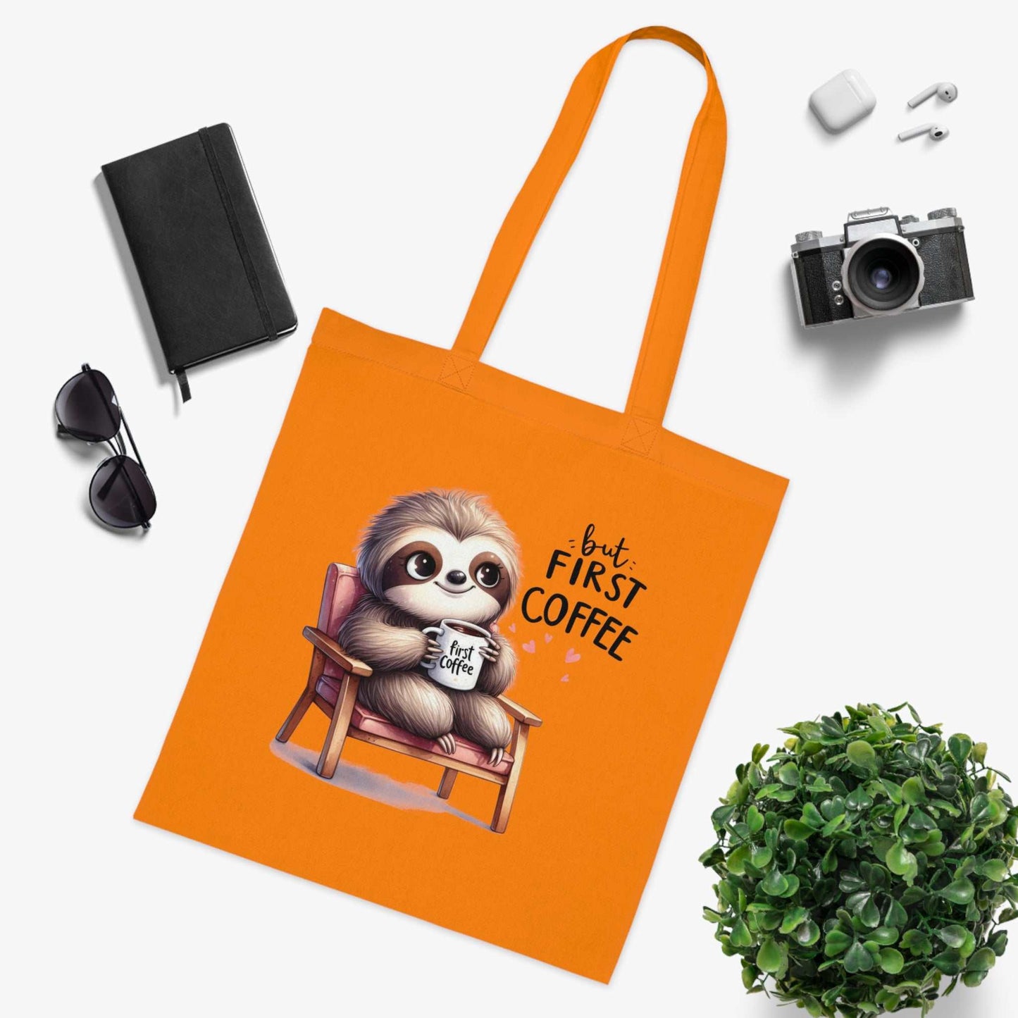 Cute sloth tote bag made from 100% cotton with vibrant design, perfect for essentials.