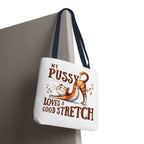 Fun stretching cat tote bag with cheeky design and colorful handles, durable polyester fabric, multiple sizes, and reusable style