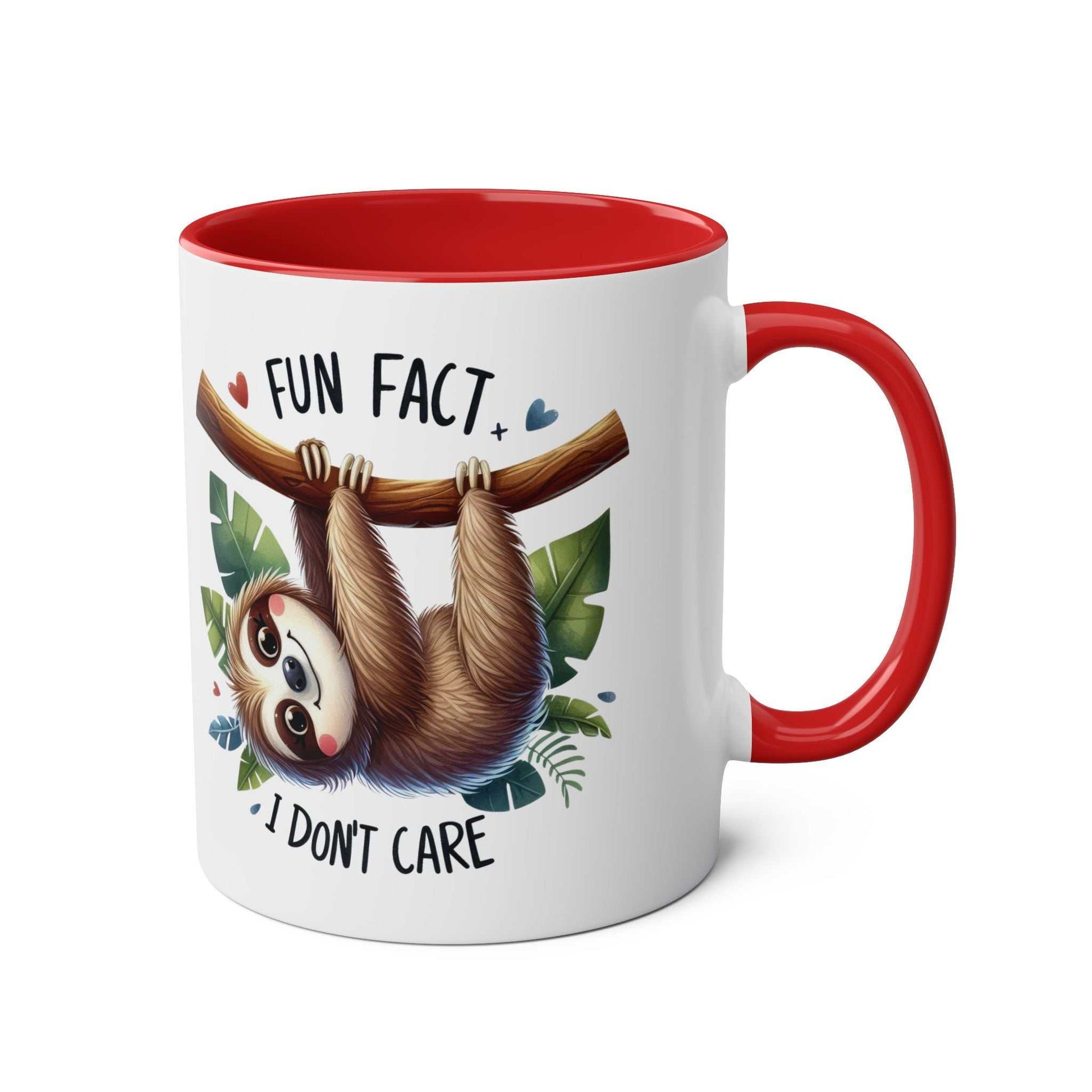 Cute sloth coffee mug with whimsical sloth design perched on a branch, red handle, and rim.