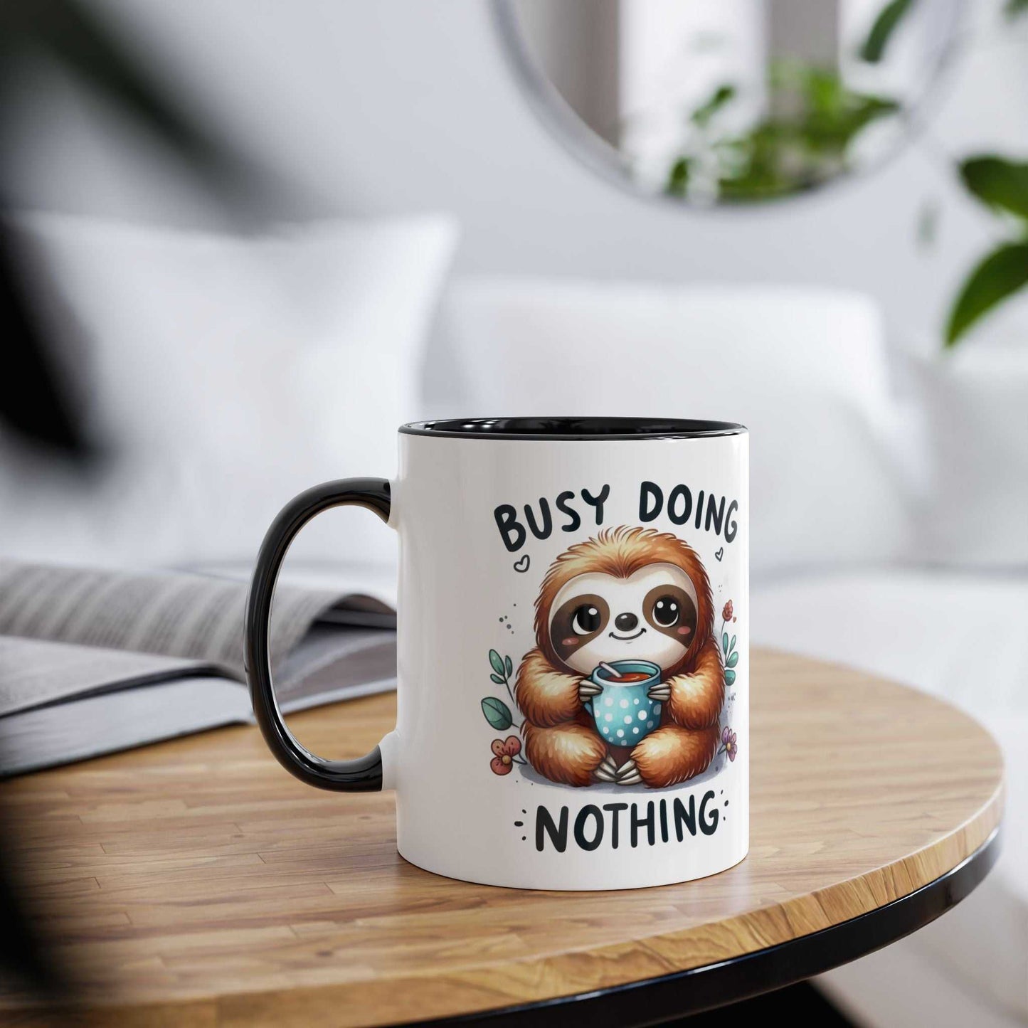 Cute sloth coffee mug with whimsical design on wooden table.