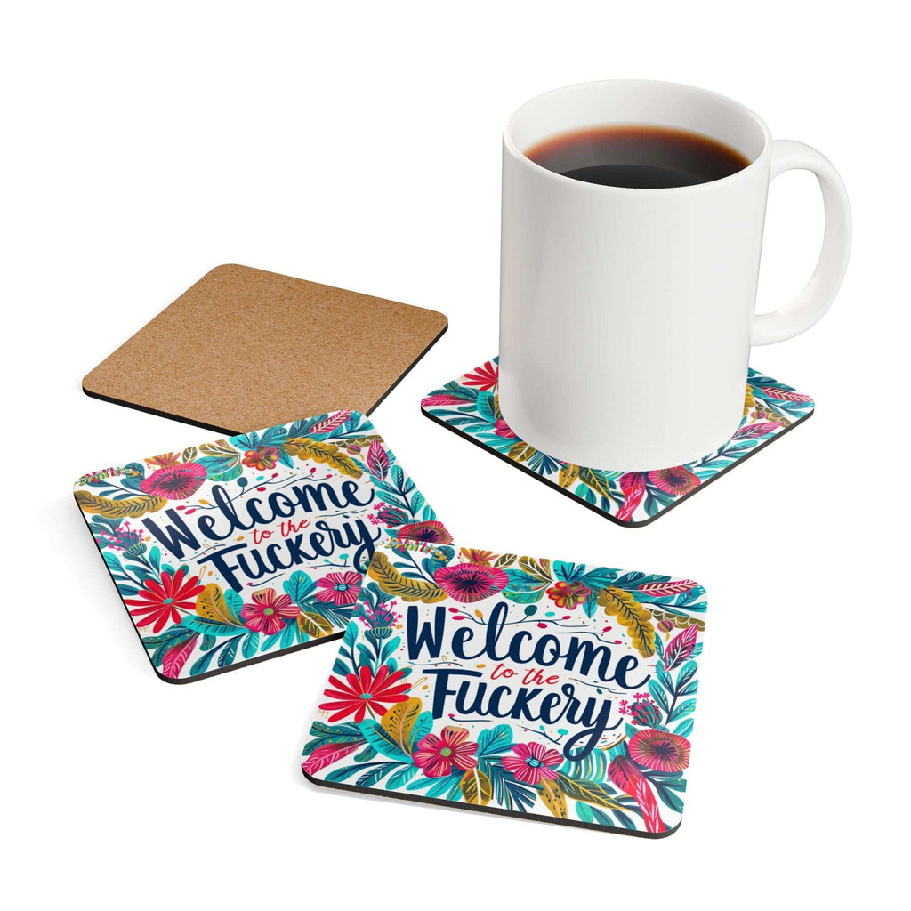 Colorful "Welcome To The Fuckery" coaster set with floral design and a mug placed on one coaster.