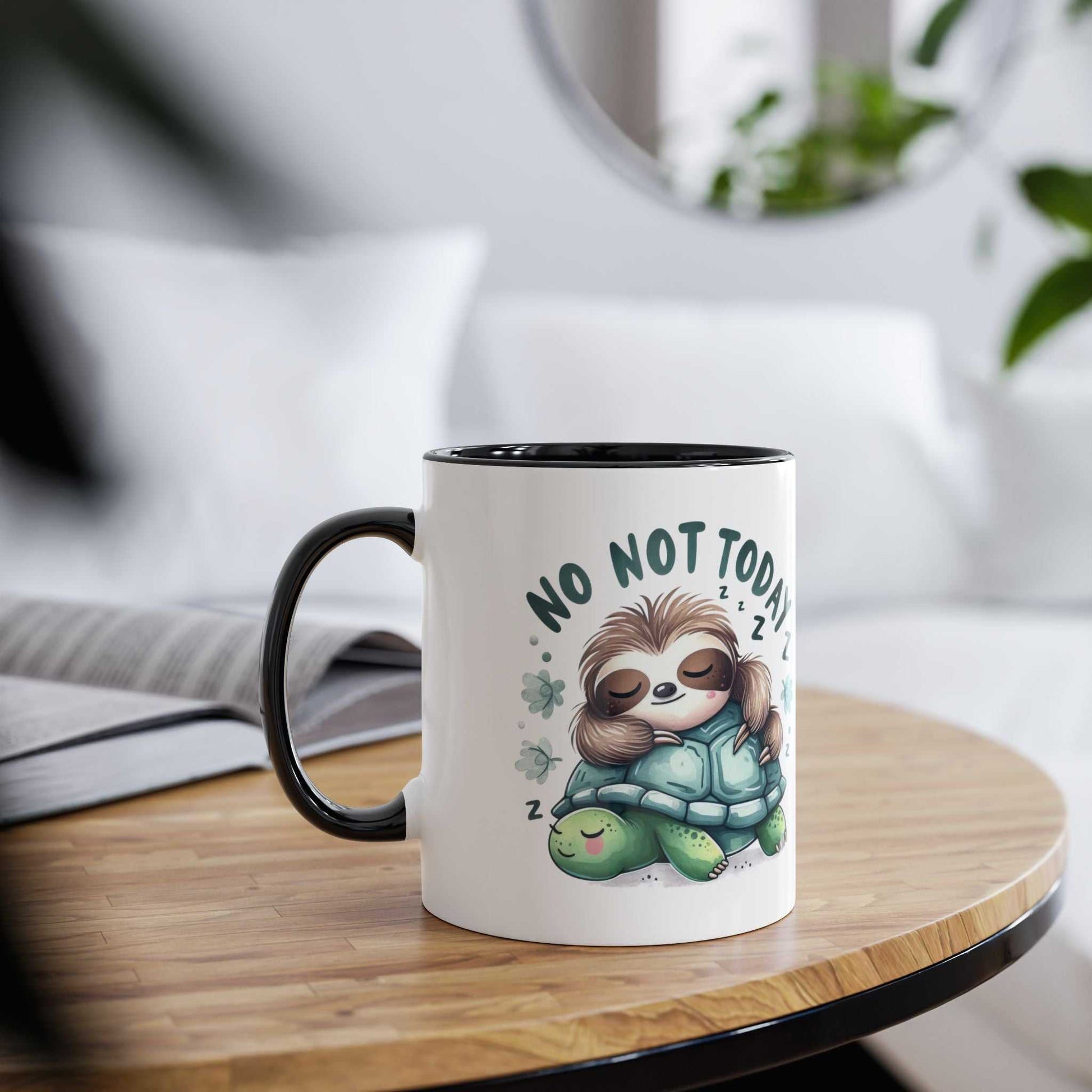 Cute sloth coffee mug with "No Not Today" design and sleeping sloth illustration on a wooden table.