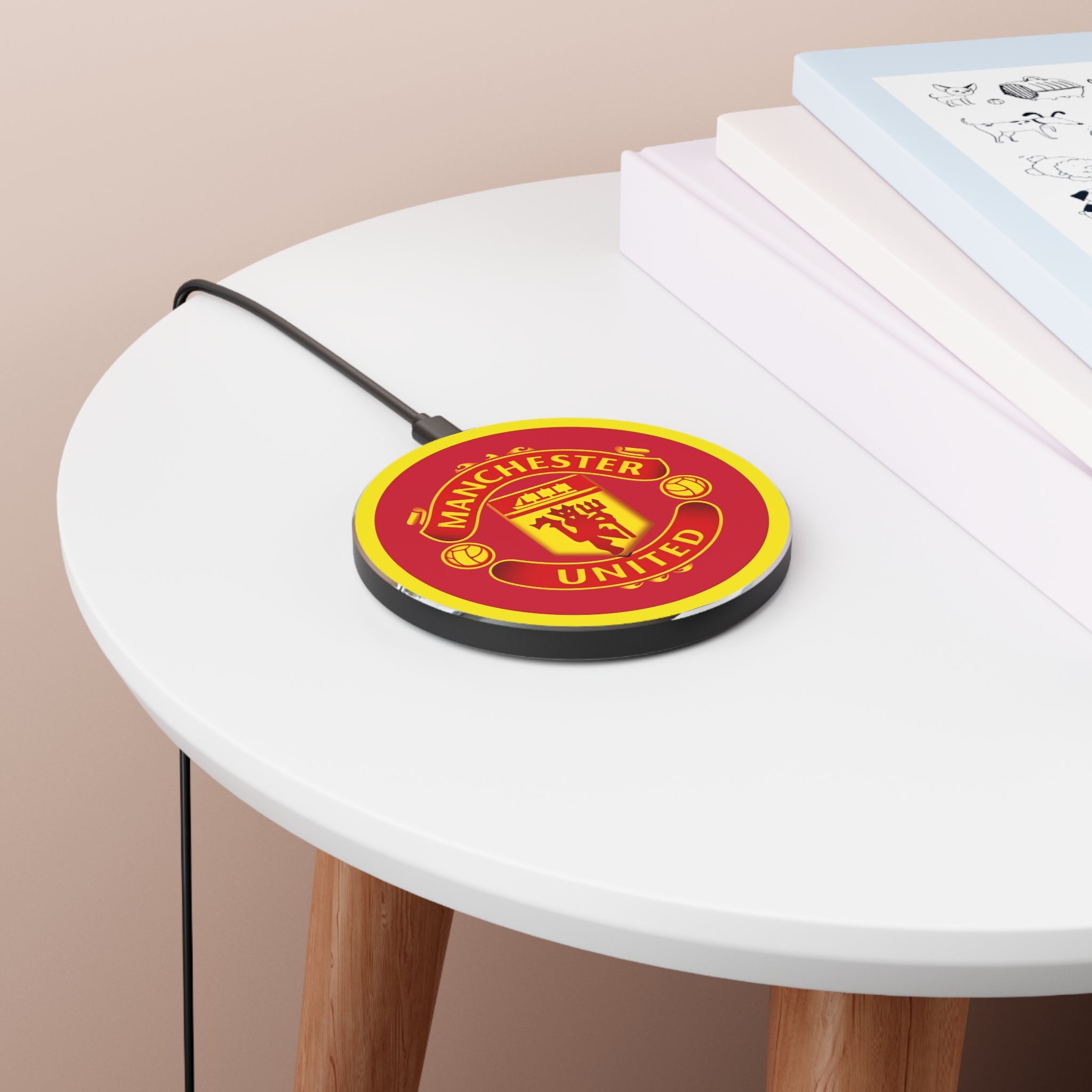 Manchester United FC wireless charger with red and yellow crest, 10W fast charging, aluminium casing, compatible with Qi-enabled devices