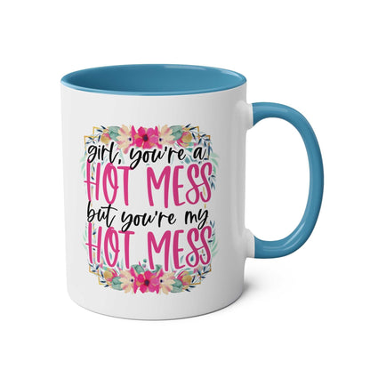 Hot Mess Coffee Mug with colorful design and playful text, featuring a blue handle and interior.