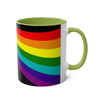 Vibrant rainbow ceramic LGBTQ+ Pride mug with green interior handle.