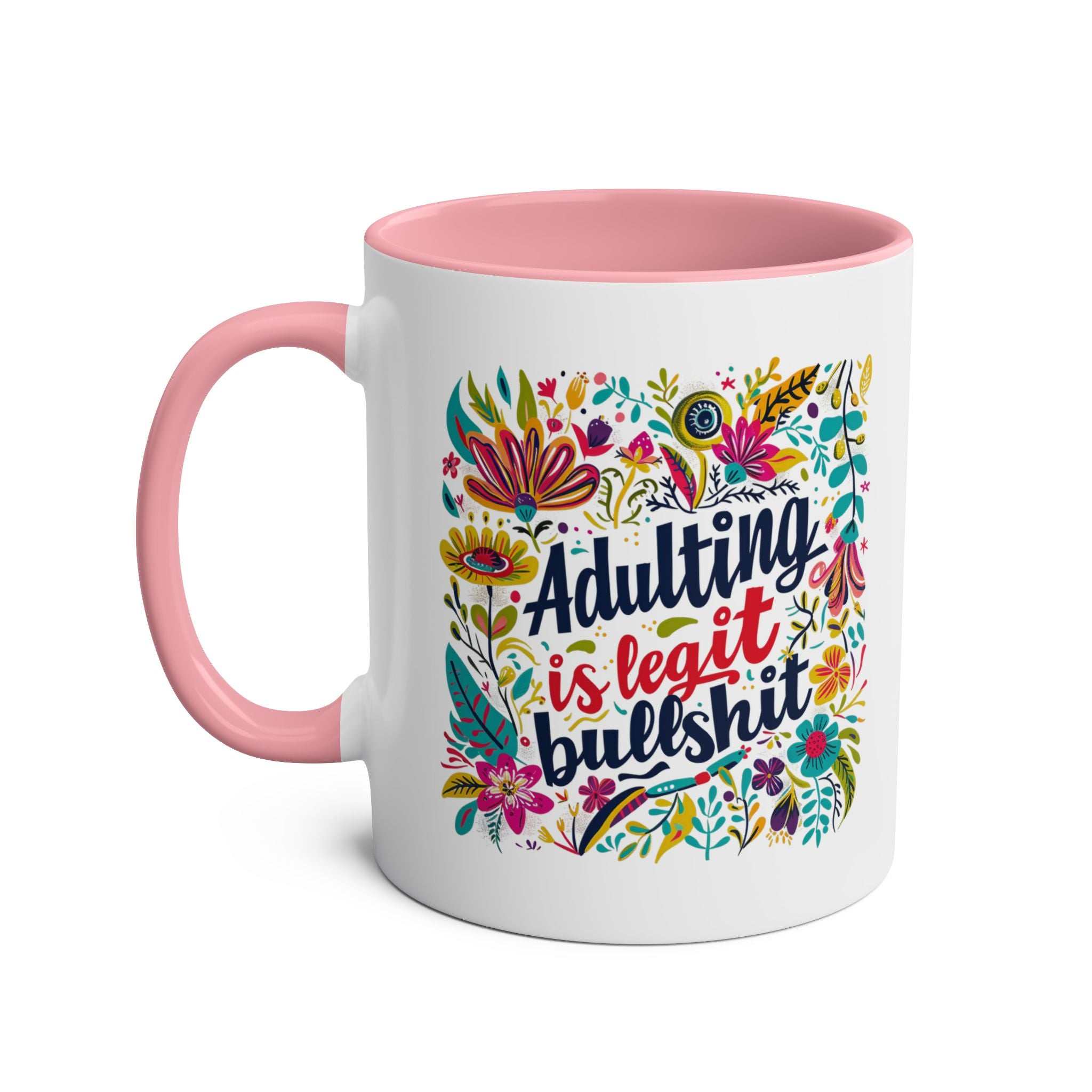 Colorful "Adulting Is Bullshit" coffee mug with floral design and pink handle.