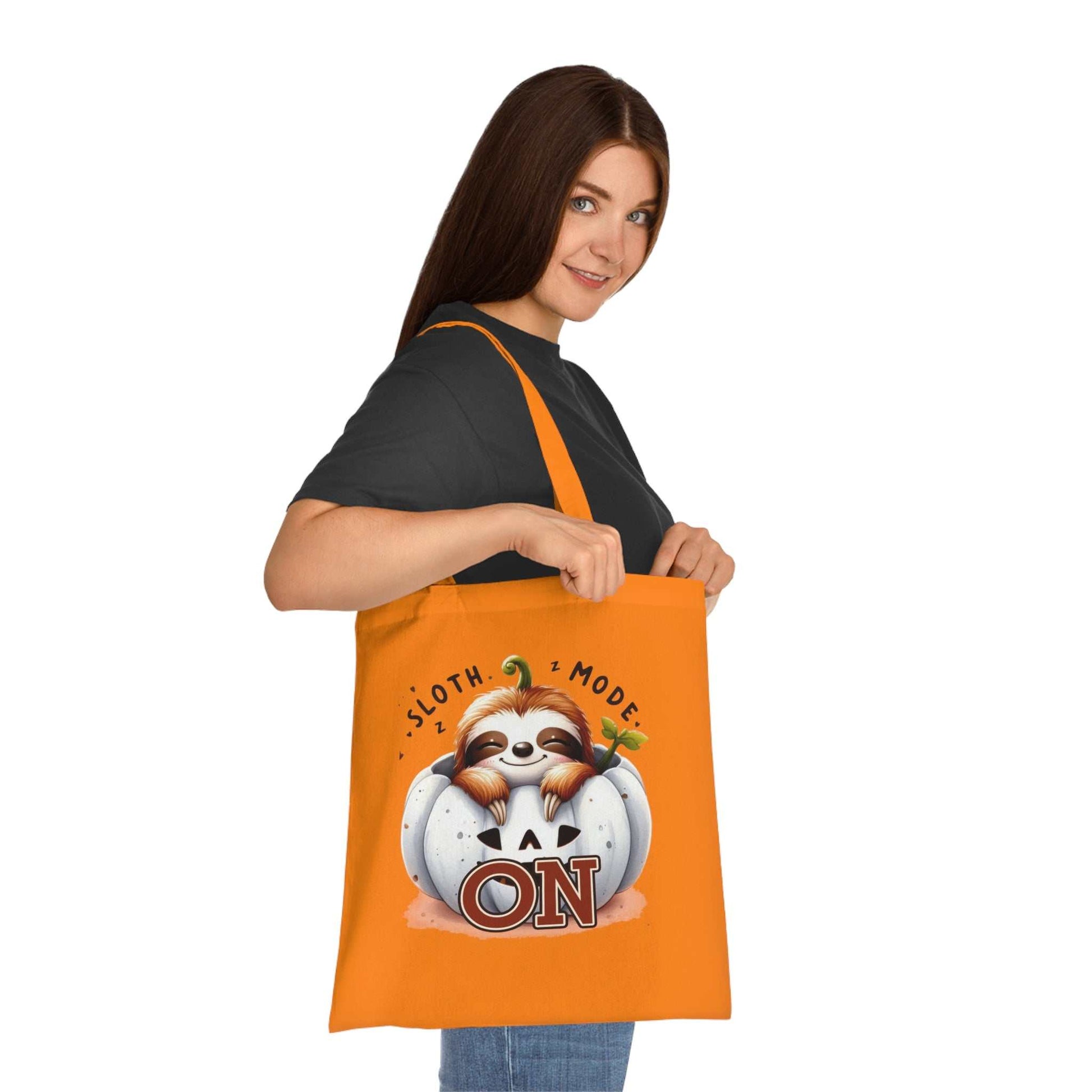 Cute sloth cotton tote bag with vibrant design, ideal for everyday essentials.