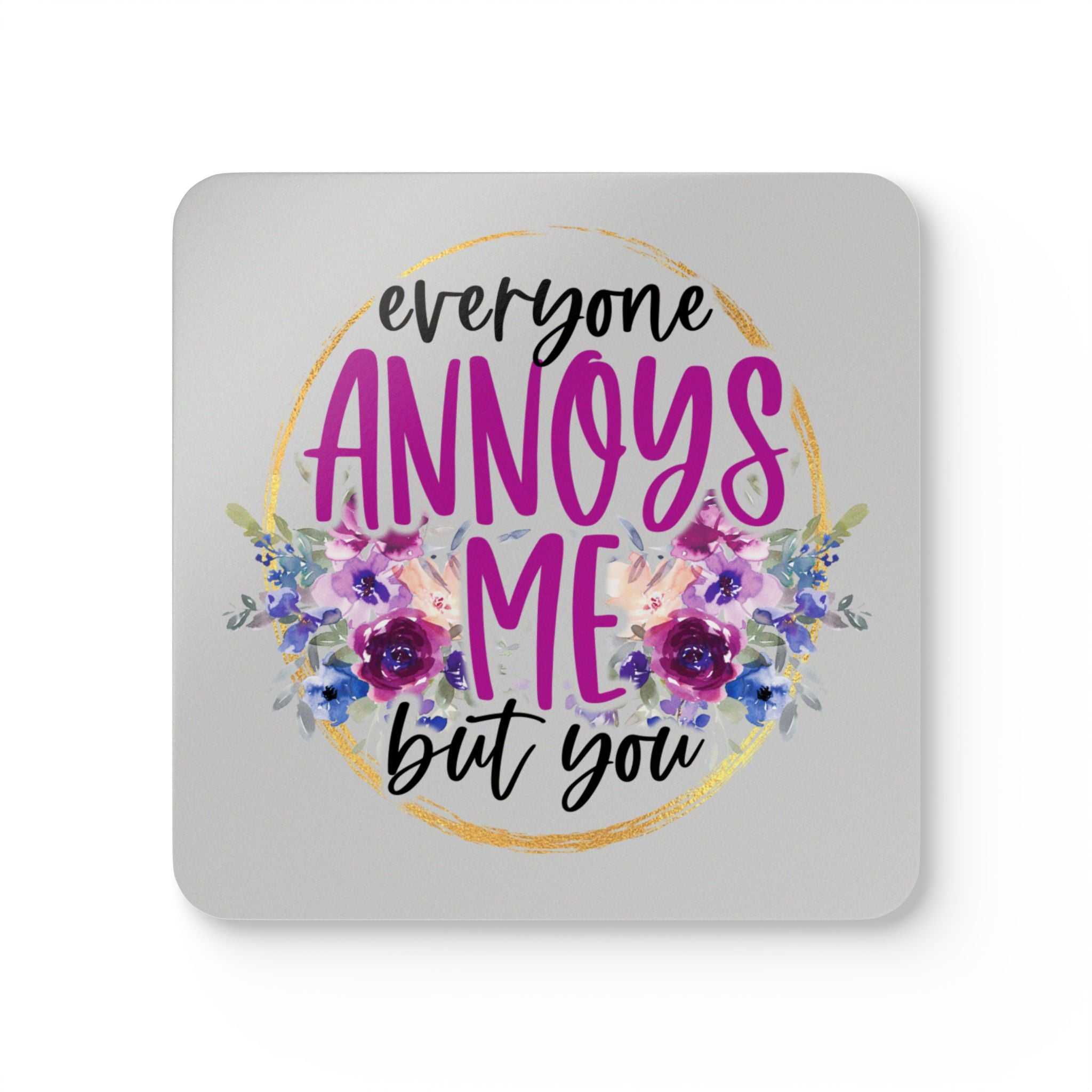 Everyone Annoys Me But You coaster set with playful design and floral accents.