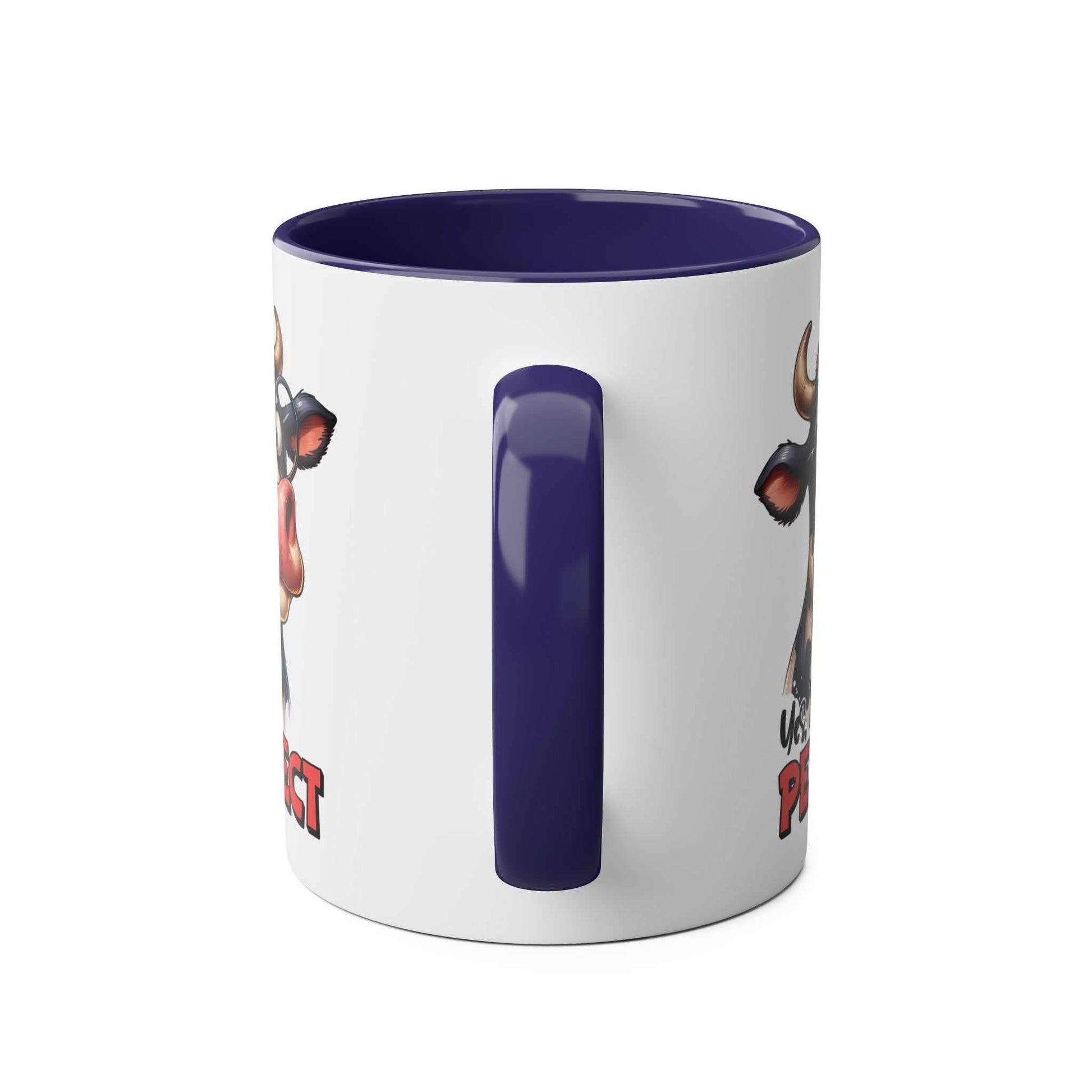 Quirky cow design on blue-handled ceramic mug, "I Am Perfect" coffee mug.