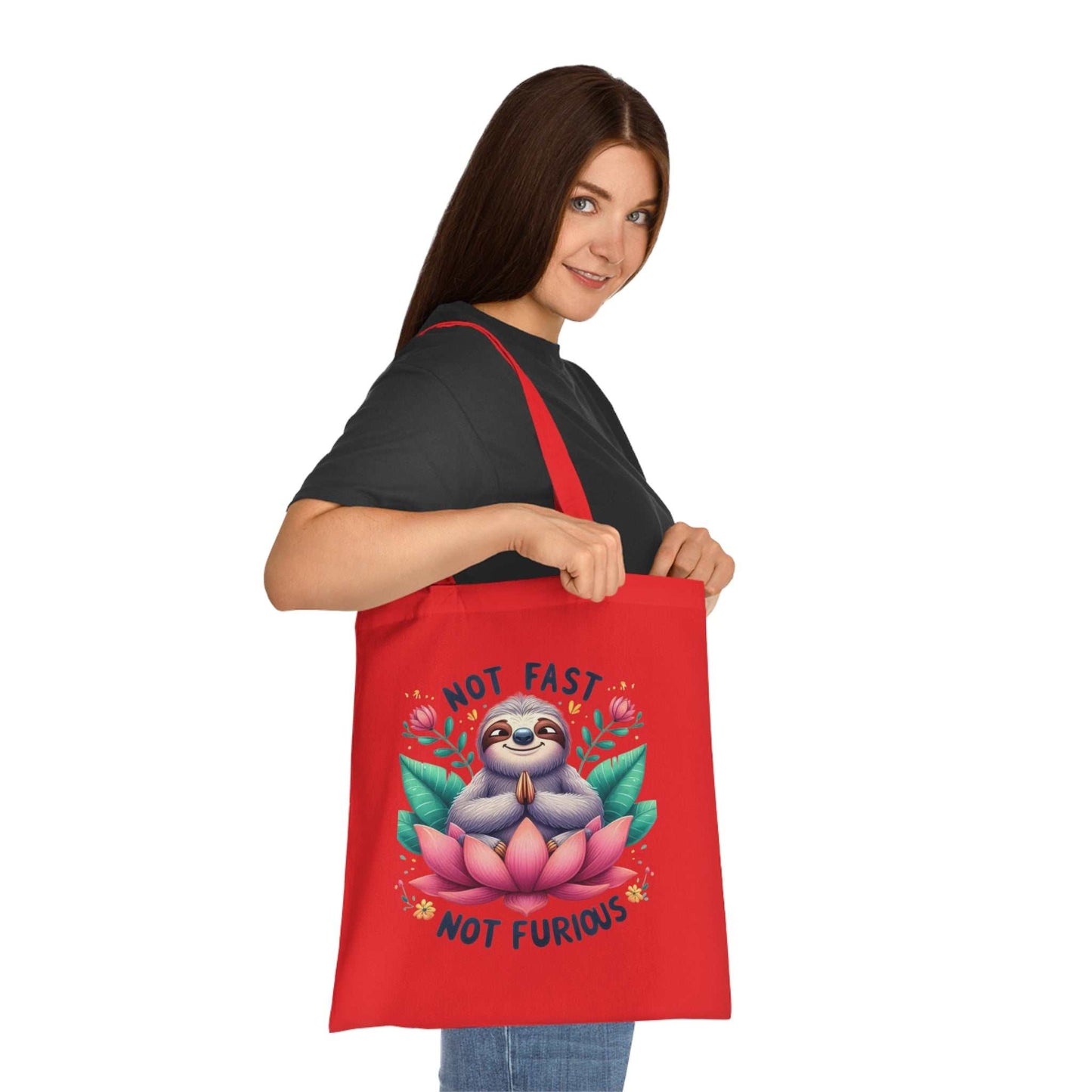 Cute sloth design cotton tote bag being carried by a woman, ideal for whimsical accessory lovers.