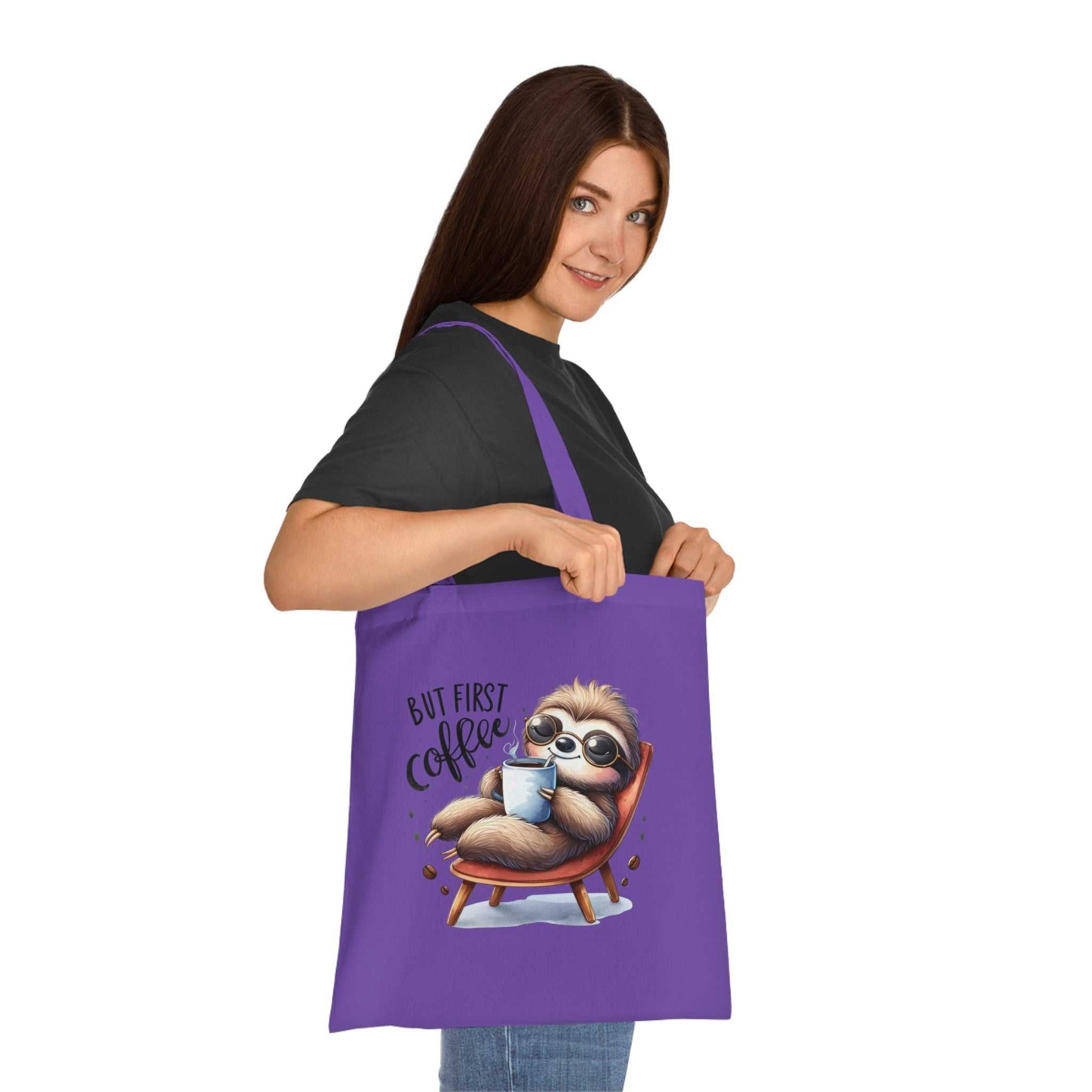 Cotton tote with cute sloth design, perfect for carrying essentials in style.