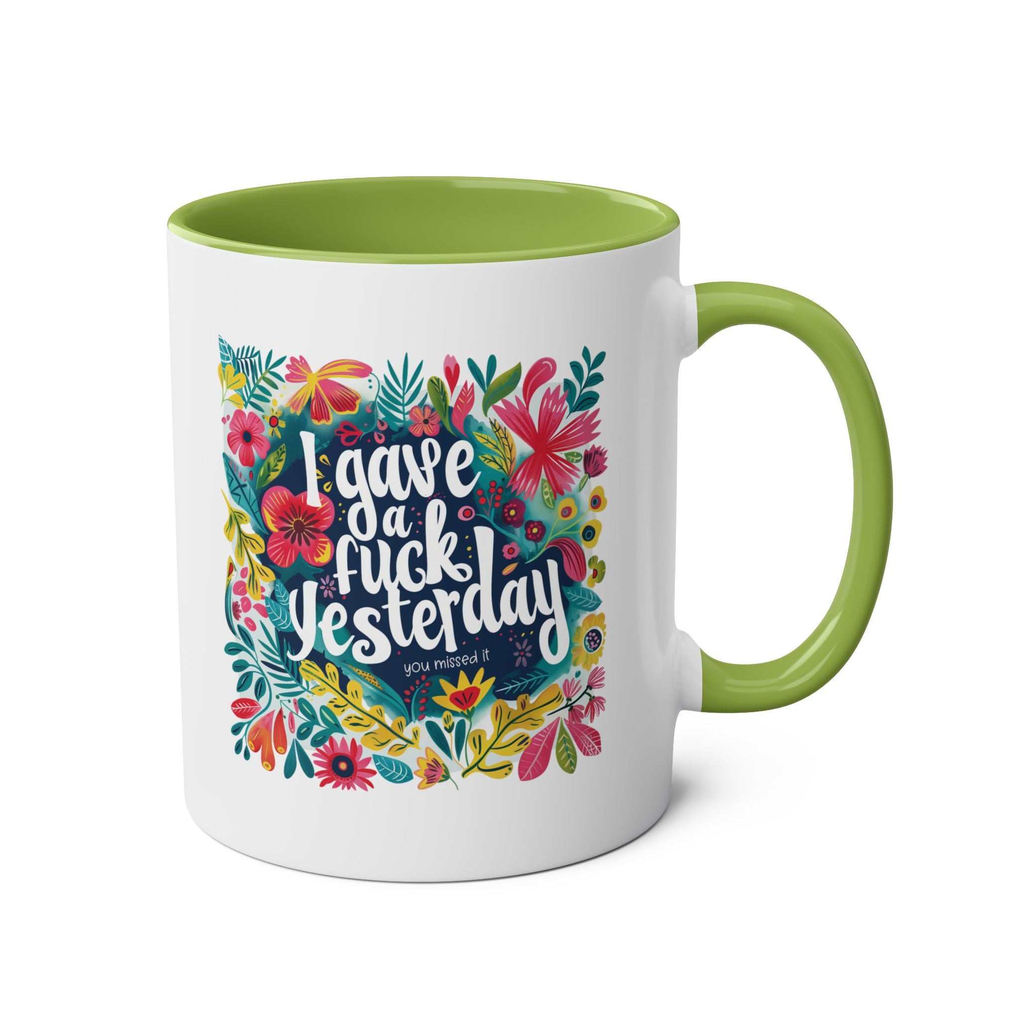Cheeky "I Gave a Fuck Yesterday" coffee mug with floral design on white ceramic, green interior.